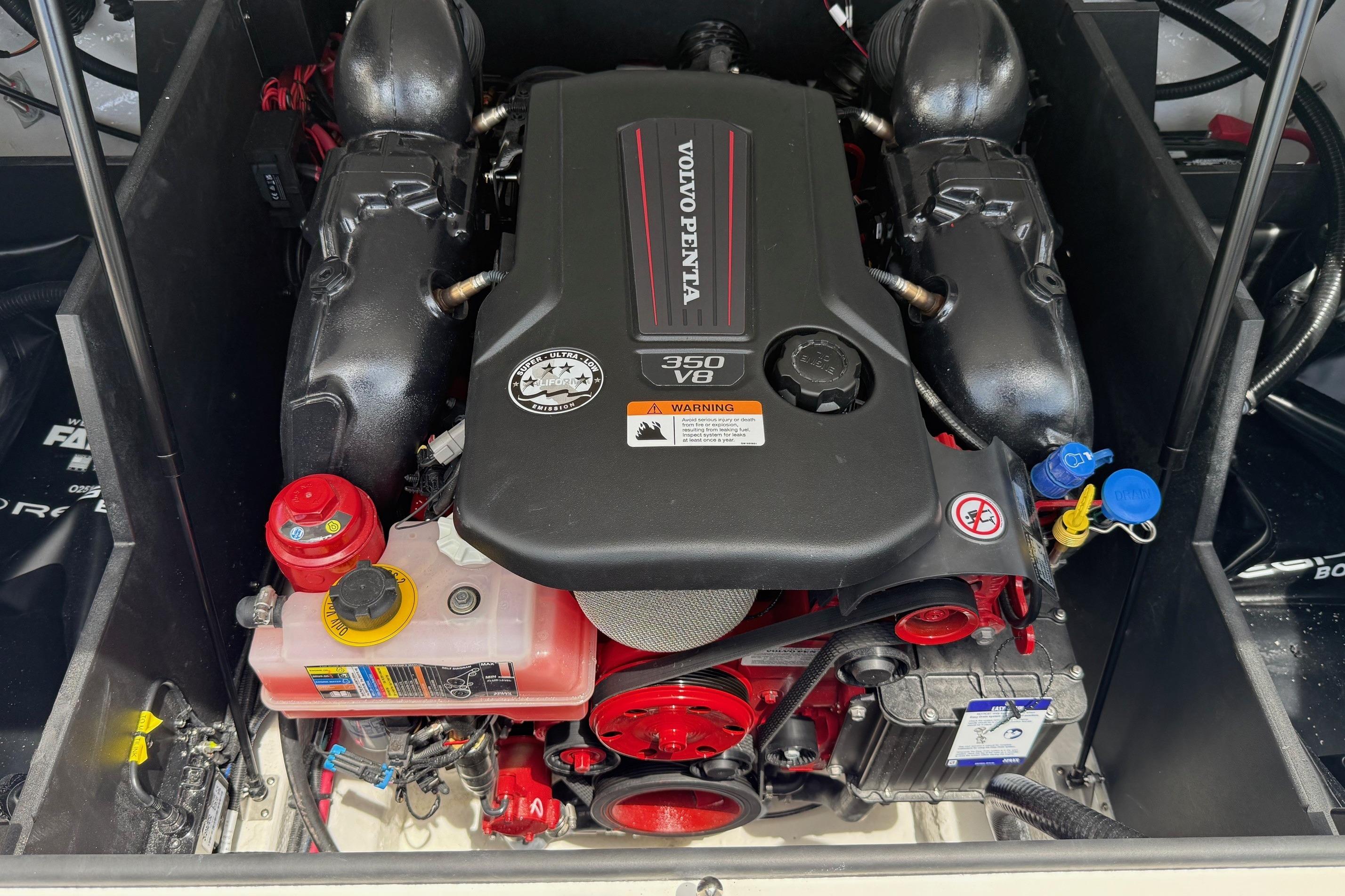Engine compartment of 2026 Regal LS4 Surf boat with Volvo Penta 350 V8 engine.