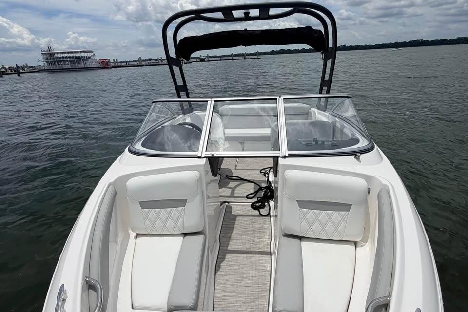 2019 Regal 1900 ES Bowrider on water, featuring sleek seating and open deck design.