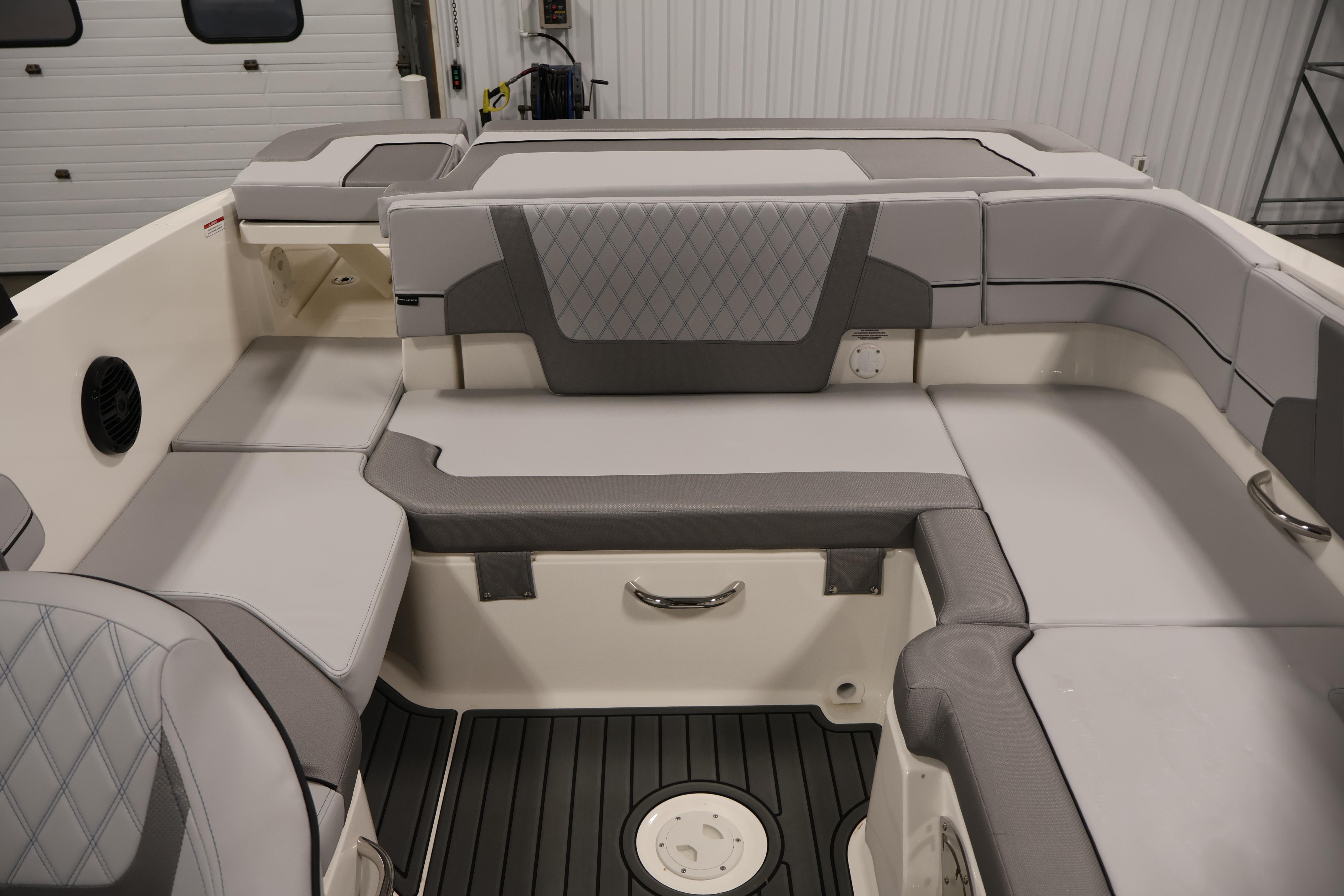 2026 Bayliner VR6 Bowrider I/O interior with gray seating and modern design.