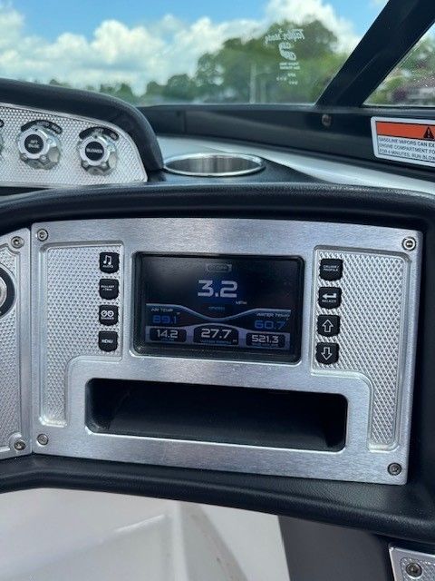 Dashboard of a 2015 MasterCraft X-2 boat with digital display.