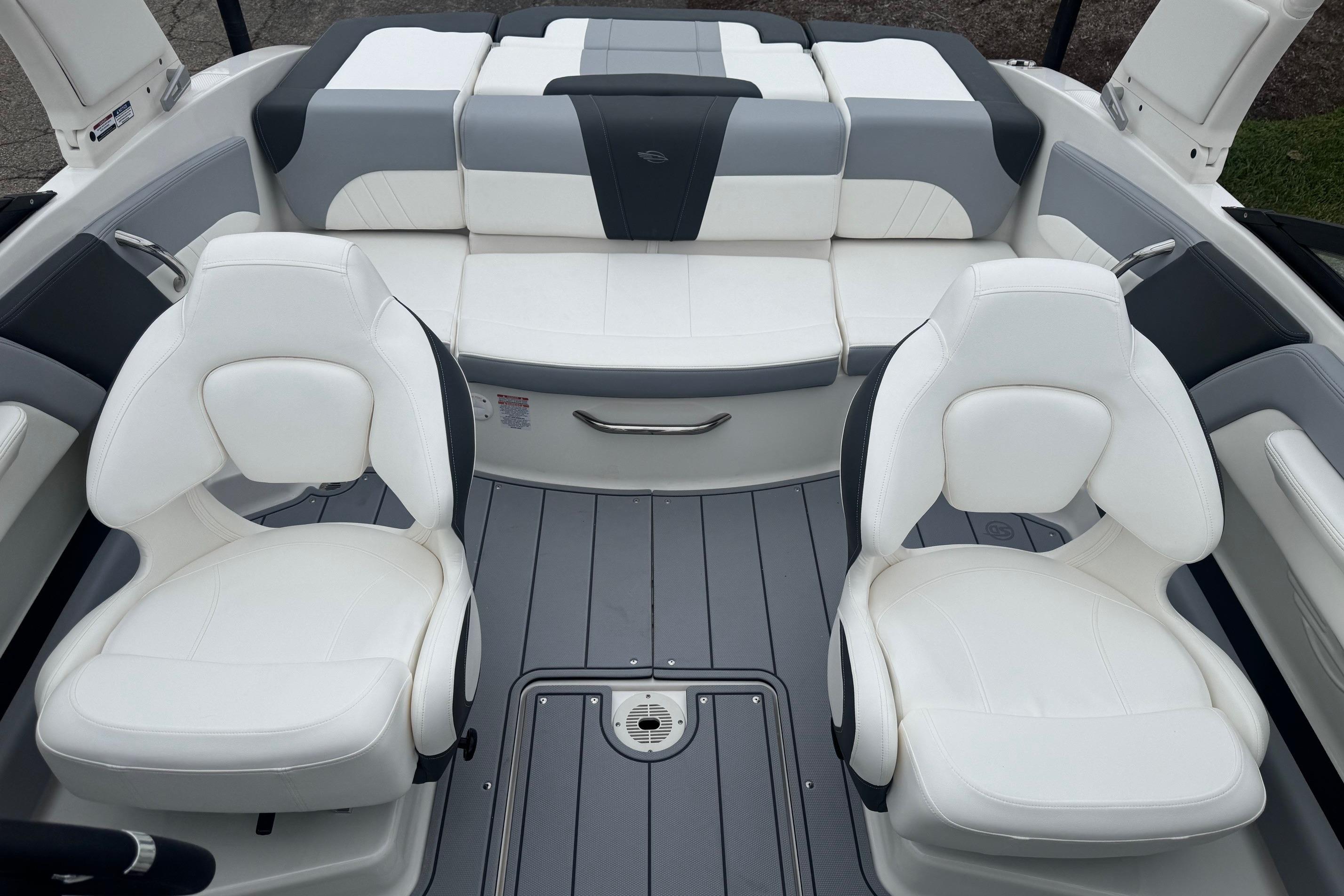 2026 Chaparral 21 SSi boat interior with white and gray seating.