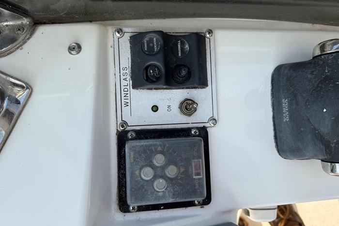 Control panel of a 2007 Island Pilot 395 boat, featuring windlass controls.