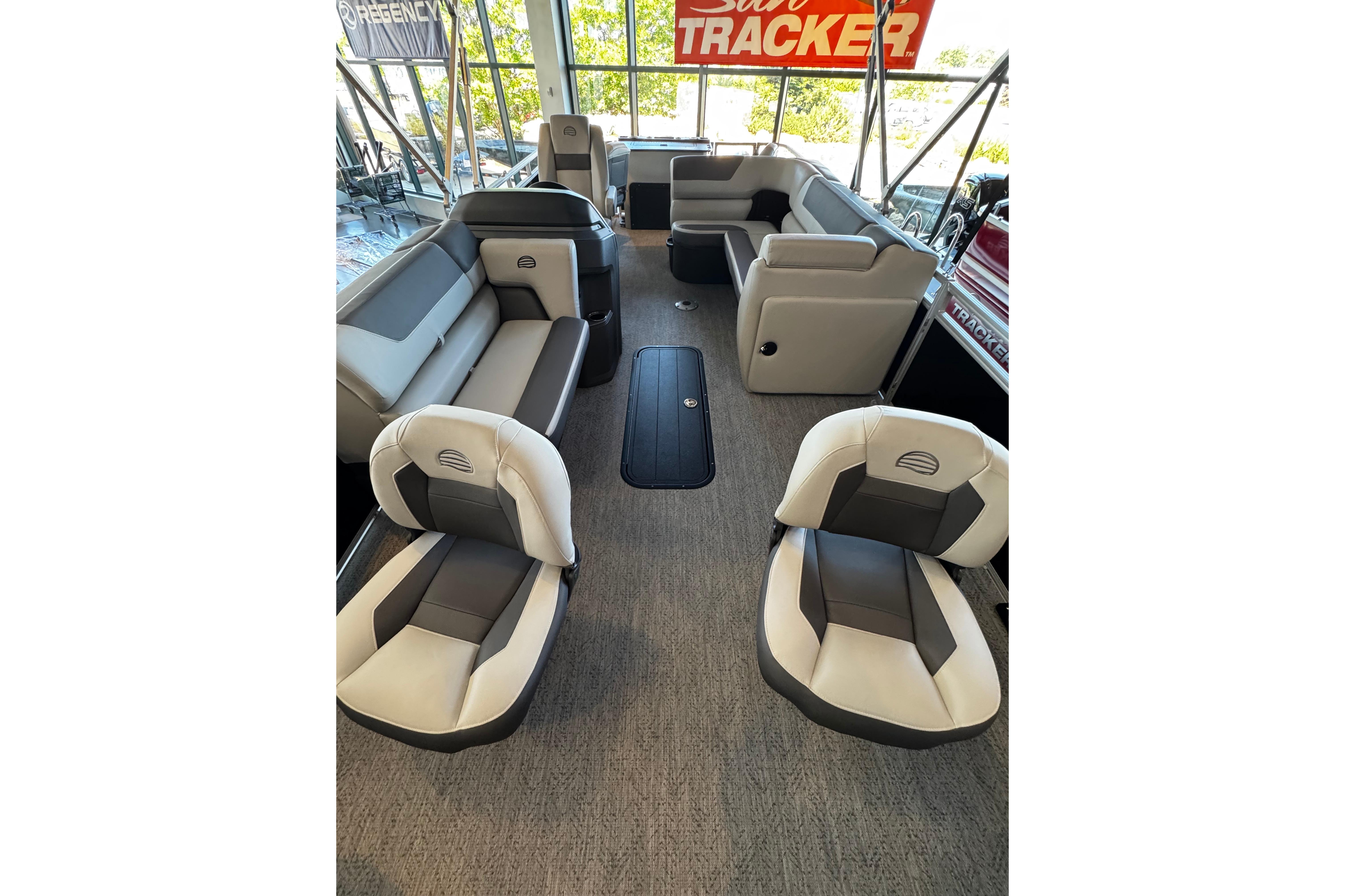 2026 Sun Tracker Fishin' Barge 22 XP3 interior with plush seating and modern design.