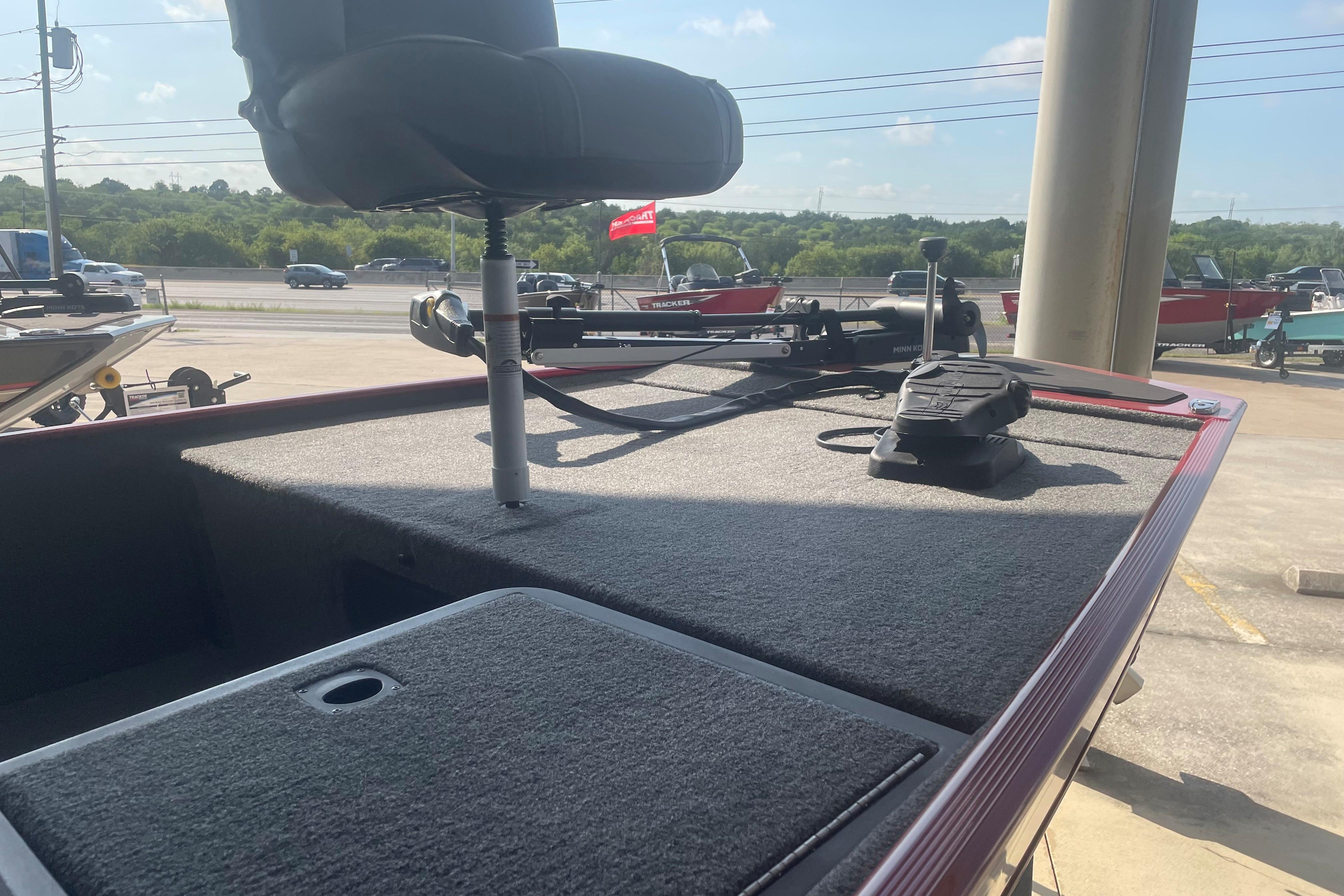 2026 Tracker Bass Tracker Classic XL boat deck with seat and trolling motor.