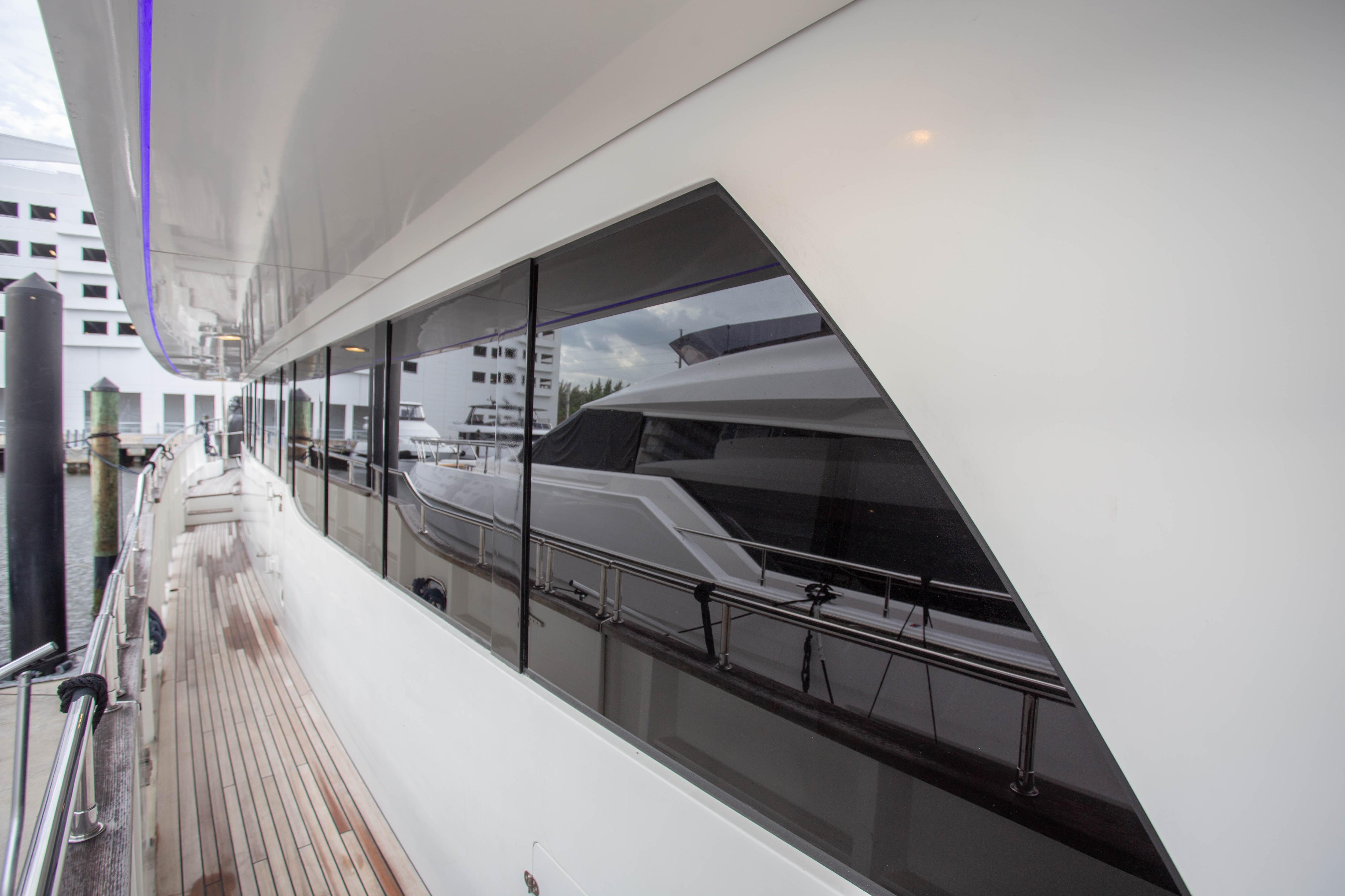Side view of 2014 Fifth Ocean Yachts 24m Displacement Explorer Yacht docked.