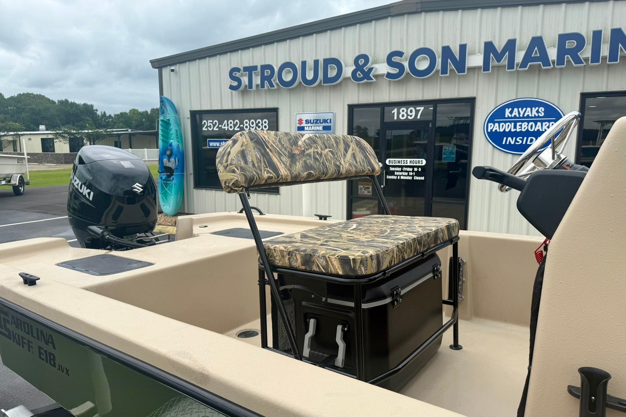 2026 Carolina Skiff E18 JVX CC boat at Stroud & Son Marine dealership.