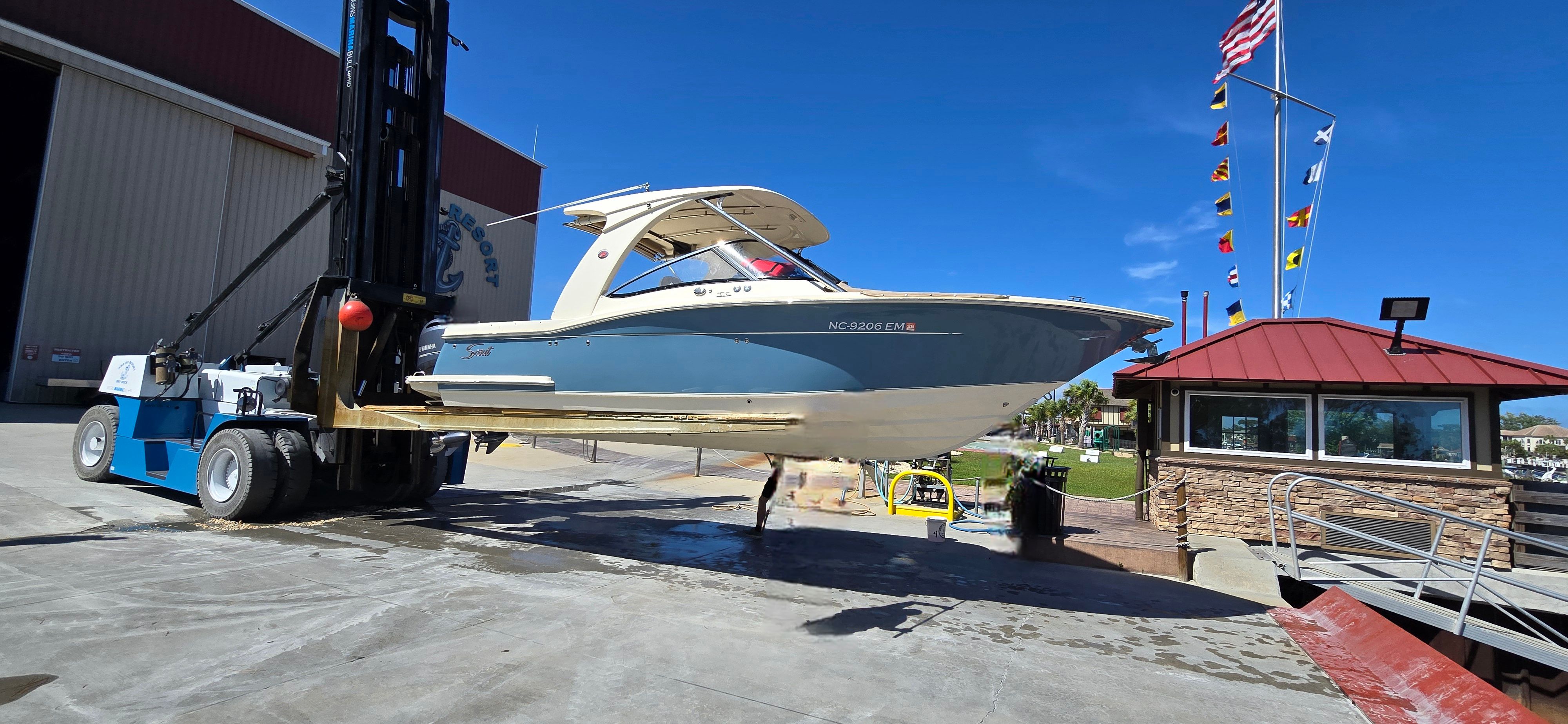 2019 Scout 275 Dorado boat being moved by forklift.