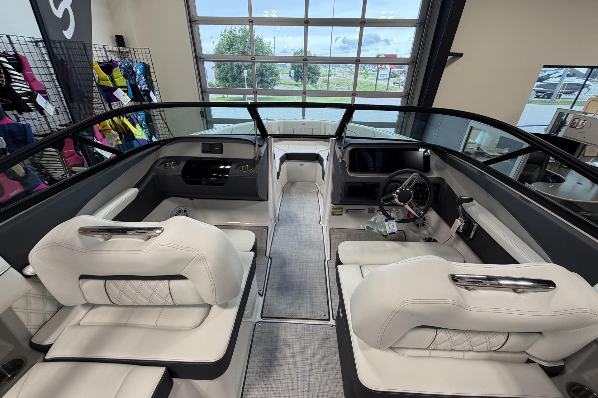 2027 Regal LS2 boat interior with white seating and modern dashboard design.