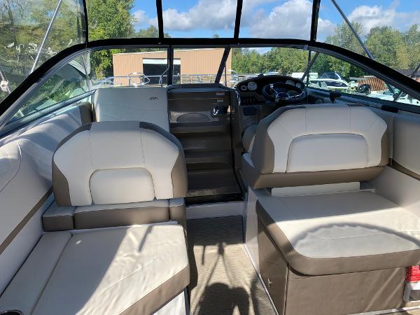 Interior of a 2017 Regal 26 Express with seating and helm station.