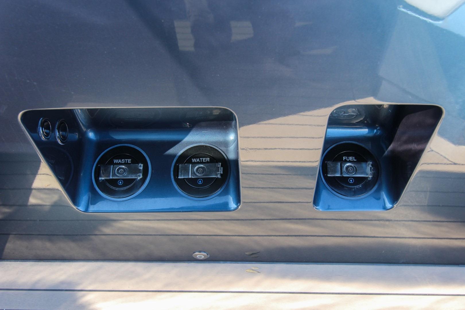 Fuel, water, and waste ports on 2022 Vanquish Yachts VQ45.