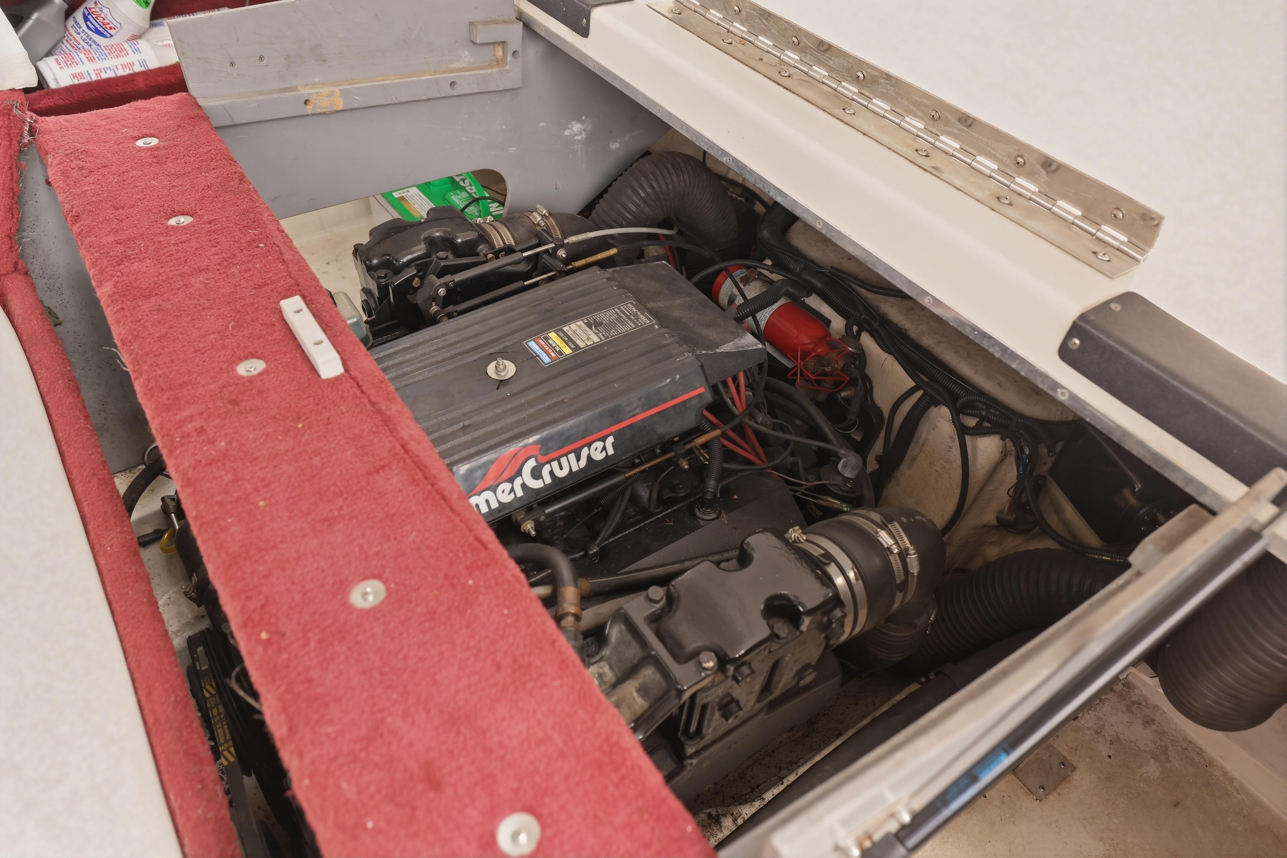 Engine compartment of a 1997 Sea Ray 230 Signature boat with MerCruiser engine.