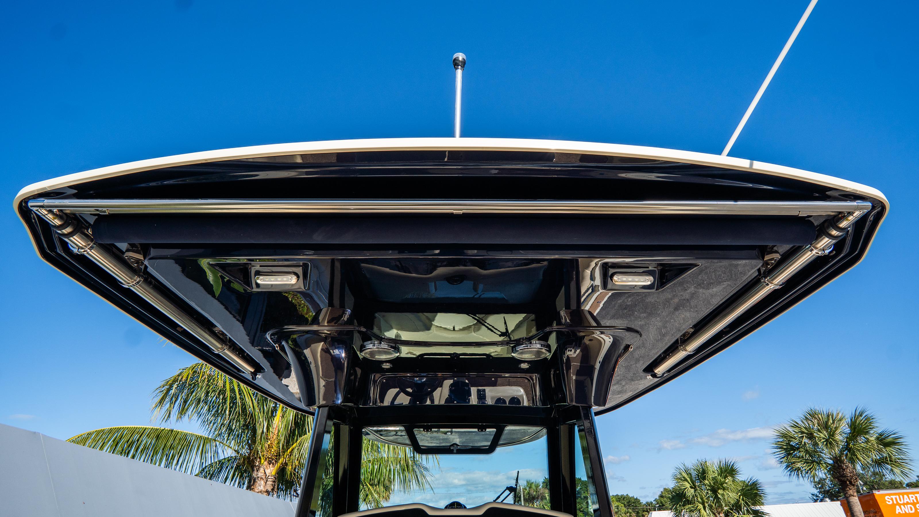2025 Chris-Craft Catalina 30 boat canopy against clear blue sky.