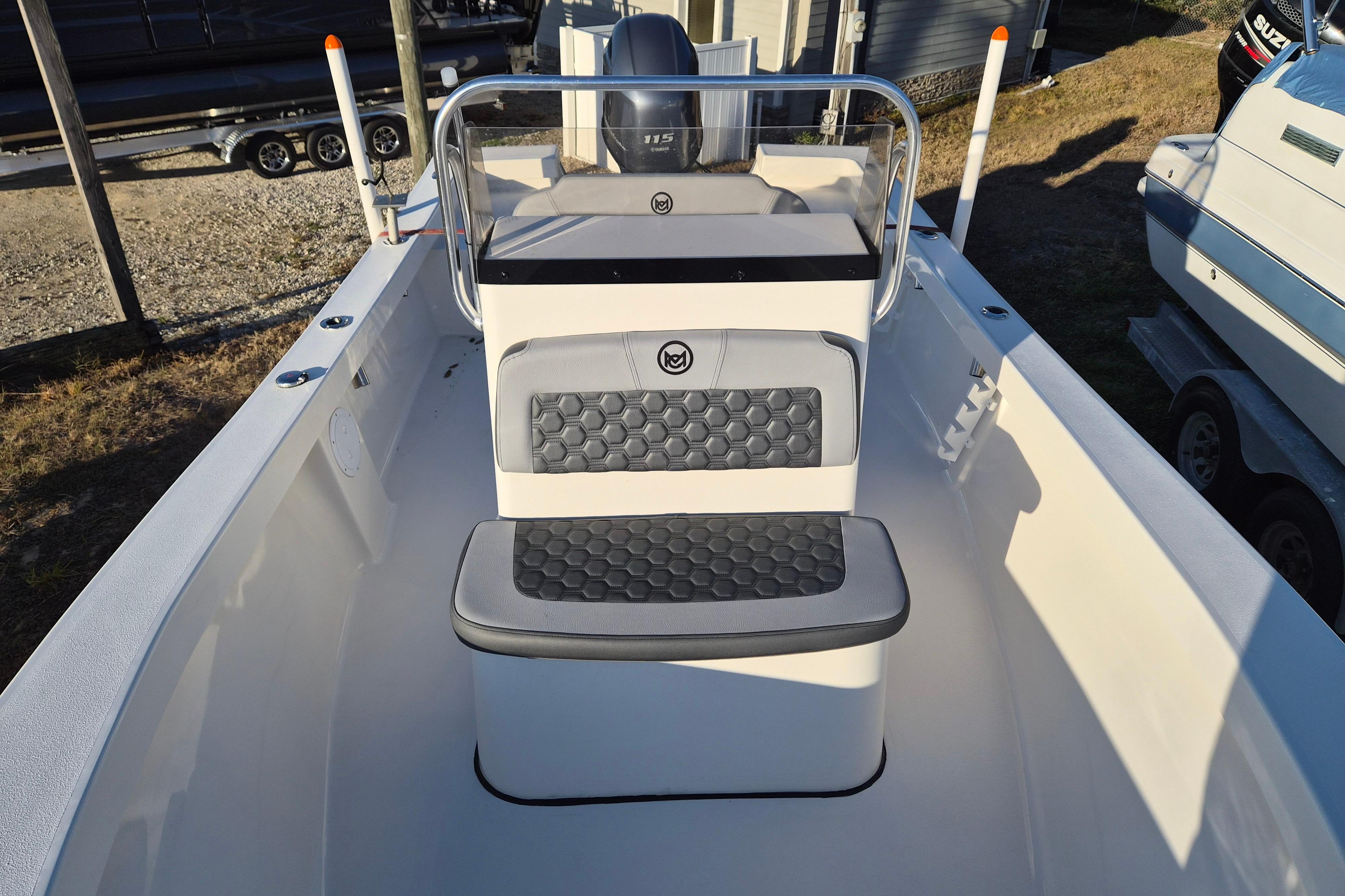 2026 May-Craft 192 boat interior with seating and steering console.