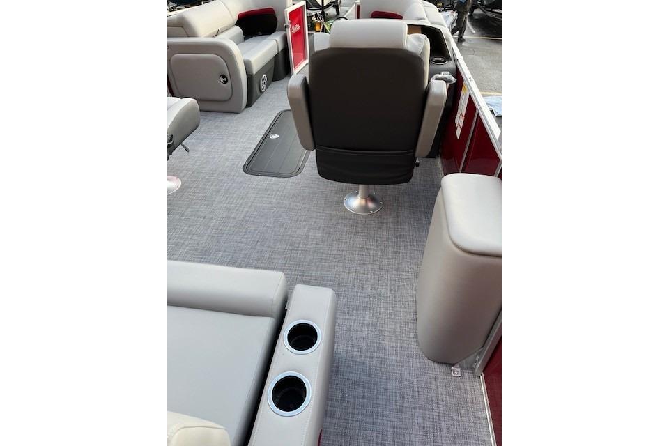 2026 Sun Tracker Party Barge 22 RF XP3 interior with seating and cup holders.