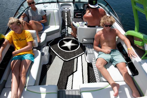 Manufacturer Provided Image: People relaxing on a 2013 Nautique Super Air Nautique 230 boat.