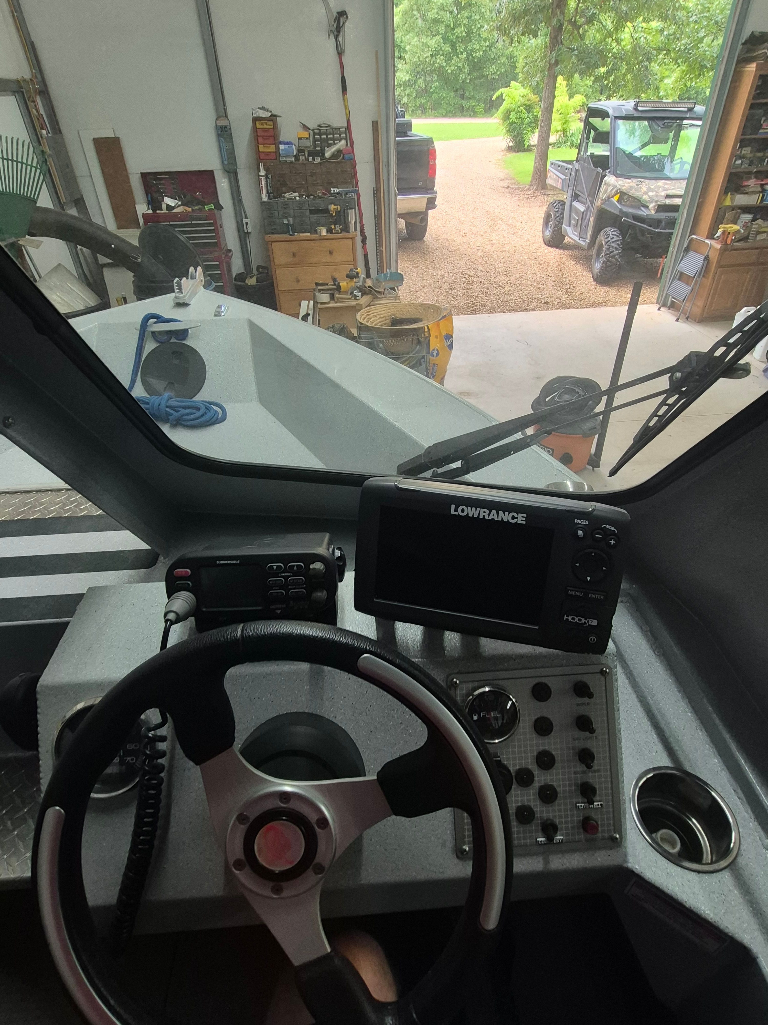 Interior view of a 2016 Duckworth 18 Advantage boat with steering and electronics.