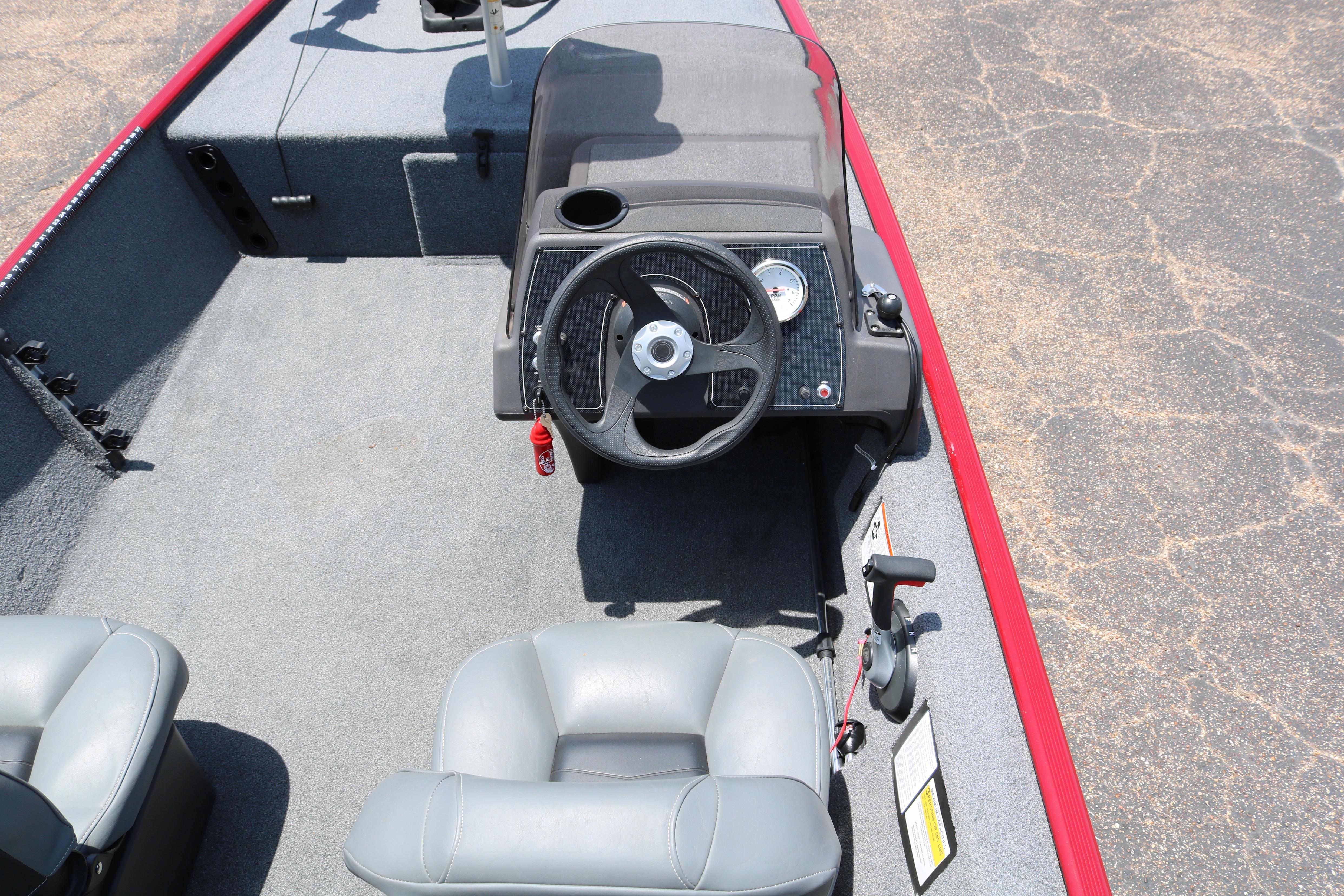 2021 Tracker Bass Tracker Classic XL boat interior with steering wheel and seating.