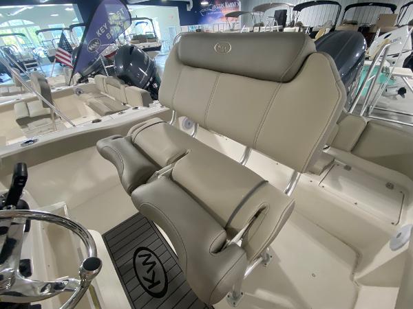 2024 Key West 203 FS boat interior with comfortable seating and modern design.