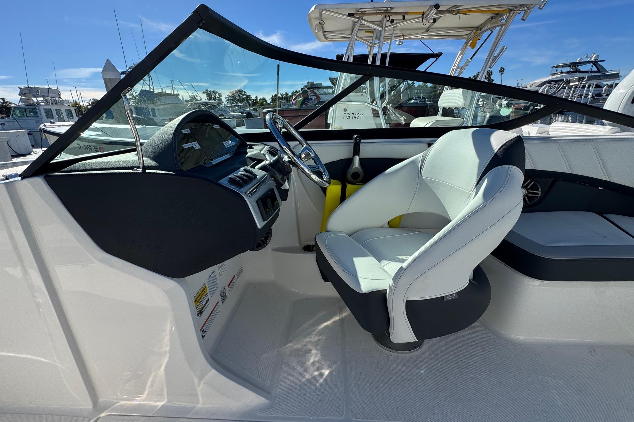 2026 Regal 21 OBX boat interior with modern helm and comfortable seating.
