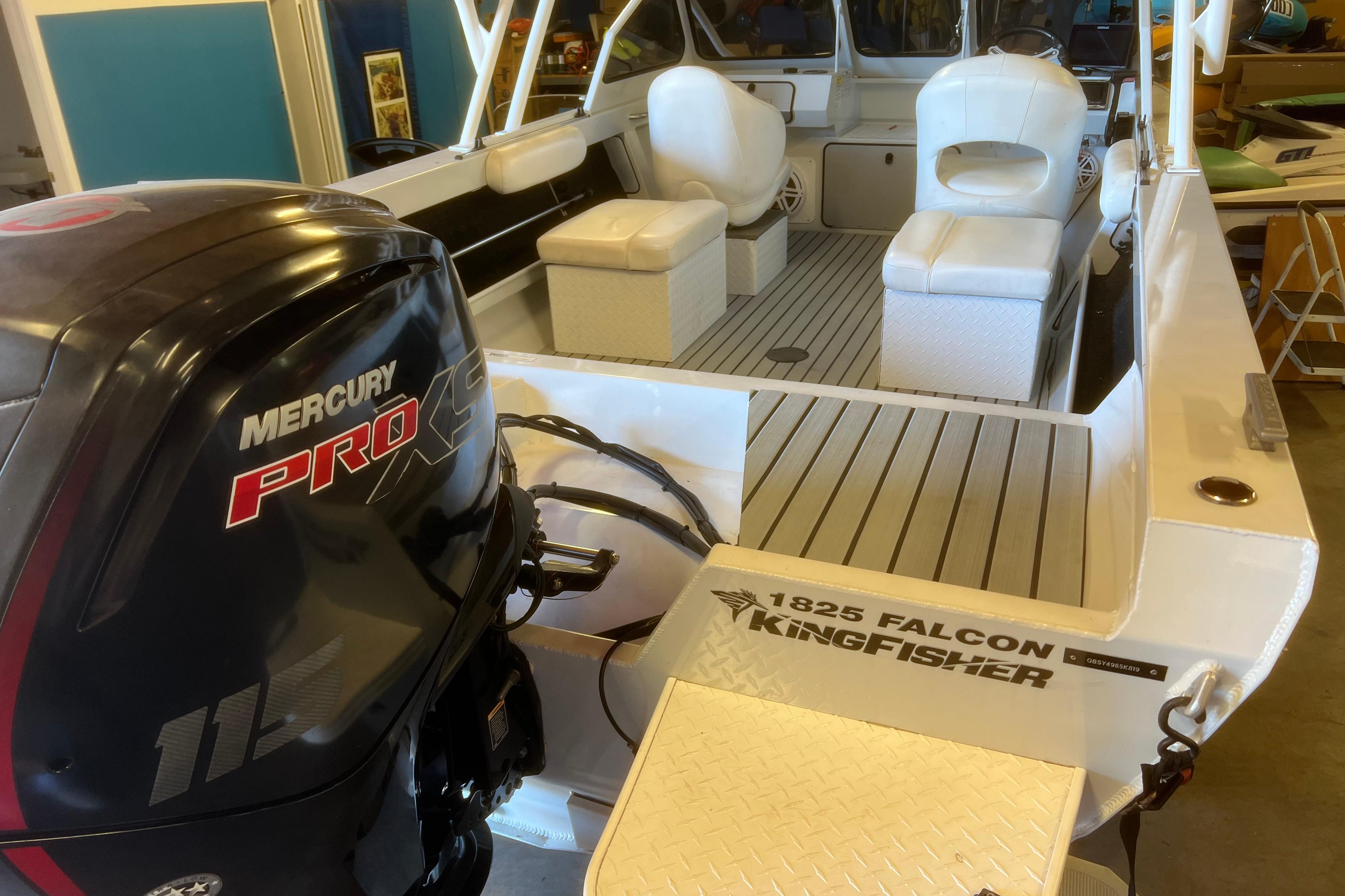 2019 KingFisher 1825 Falcon boat with Mercury Pro XS engine, featuring spacious seating.