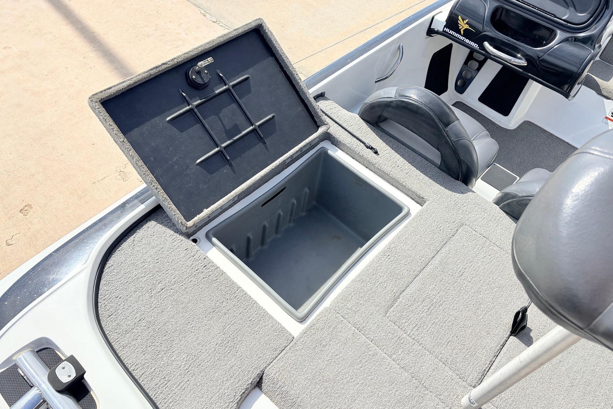2011 Nitro Z-7 boat interior with open storage compartment and seating.
