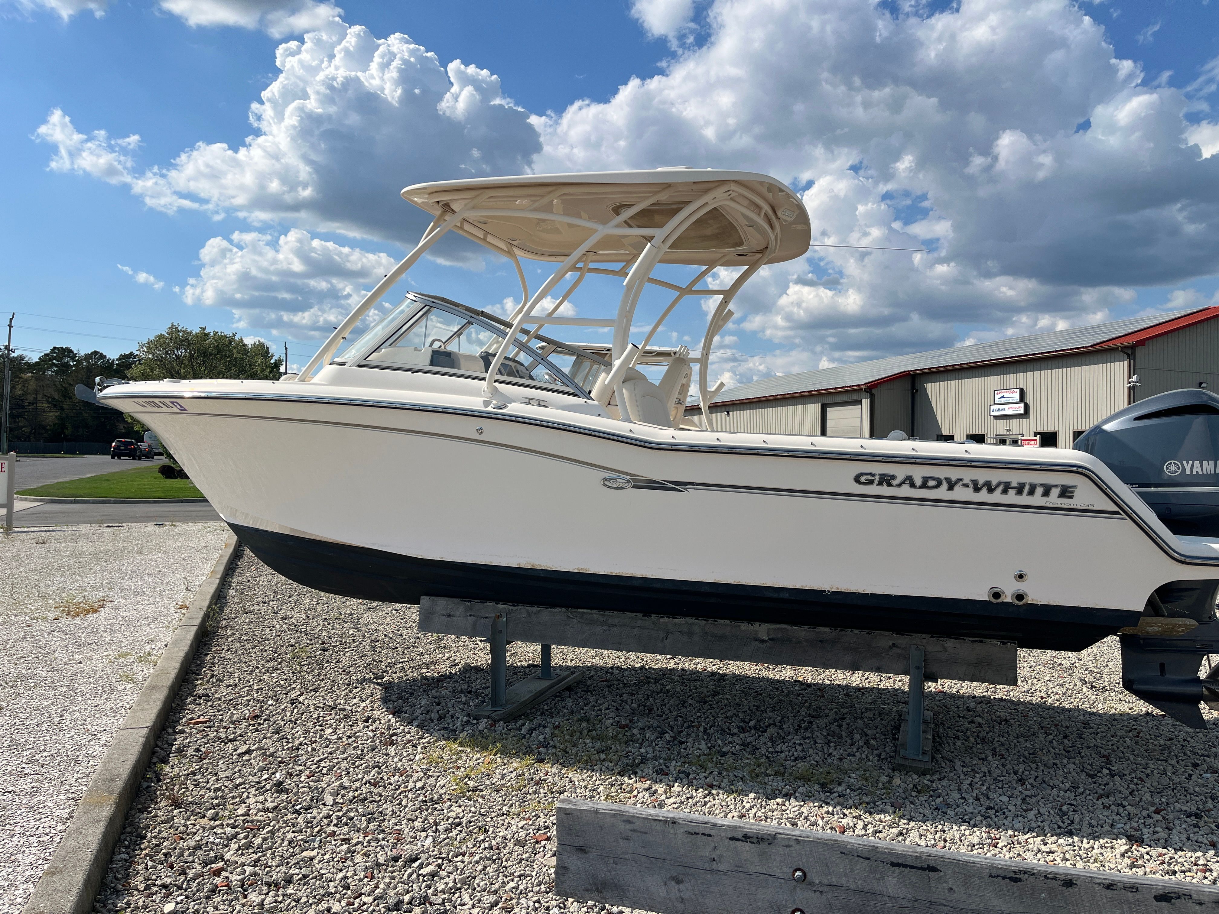 2018 Grady-White Freedom 235 boat on gravel lot.