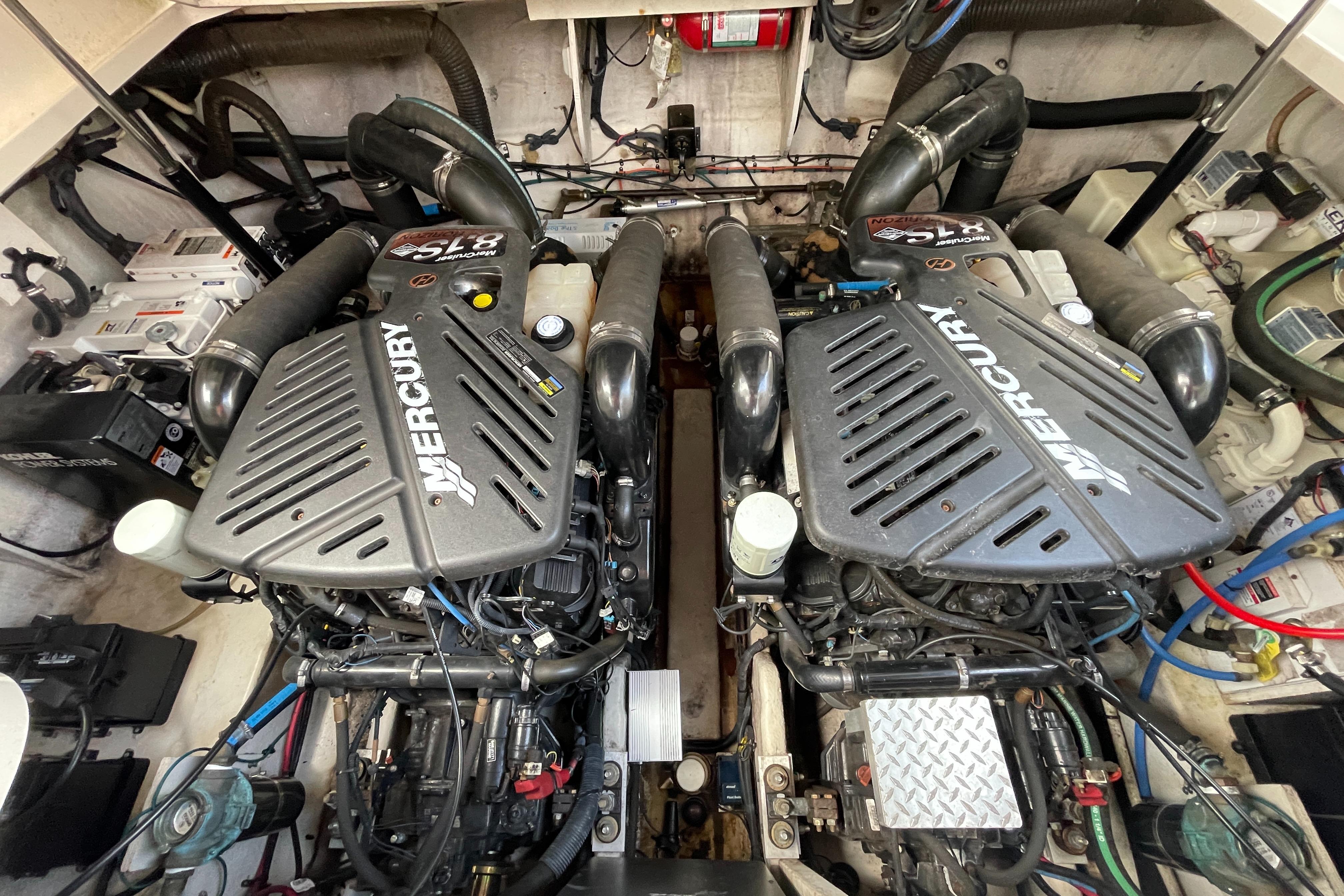 Engine room of 2007 Sea Ray 340 Sundancer with twin Mercury engines.