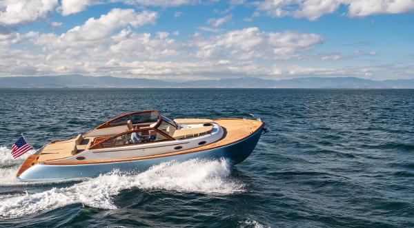 2023 Vento V40 Retro Classic Open boat cruising on the ocean.