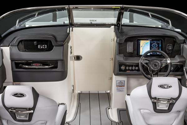 2025 Chaparral 2870 boat interior with modern dashboard and steering wheel.
