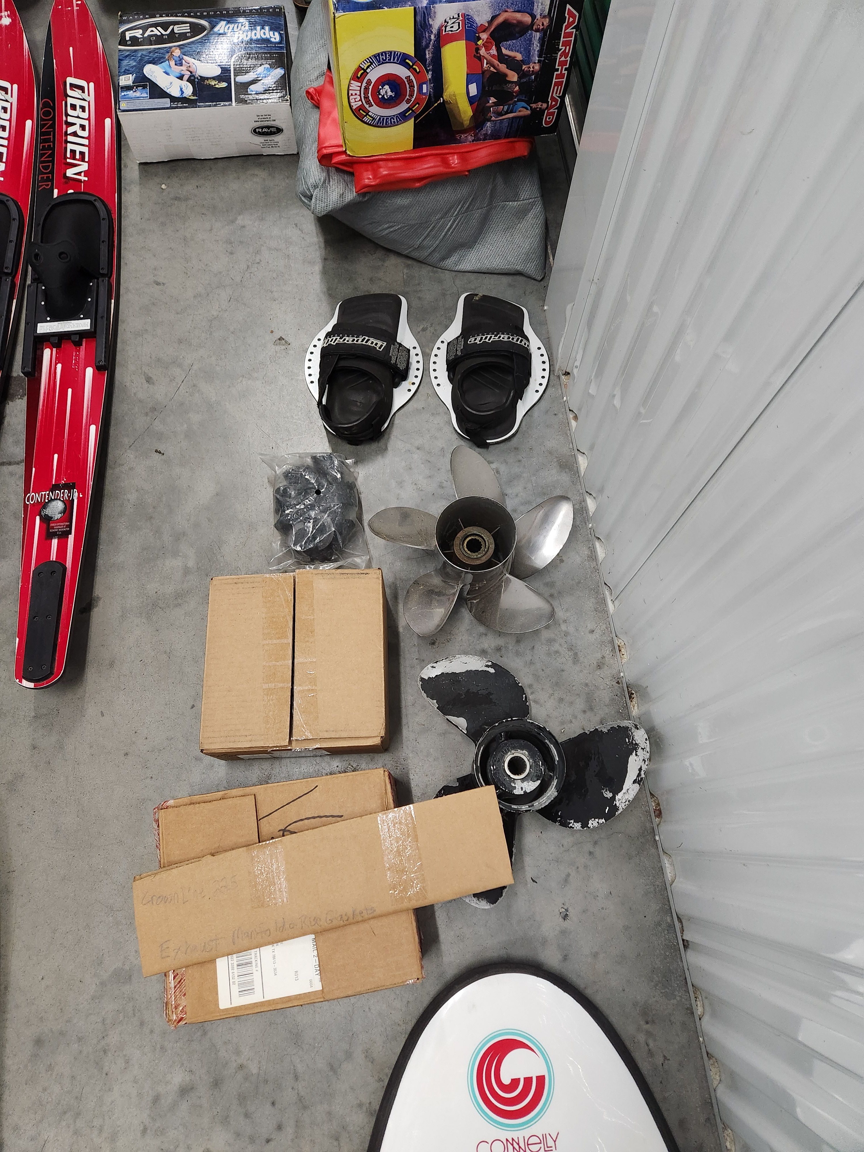 Boat accessories and water skis alongside Crownline 225 BR parts.