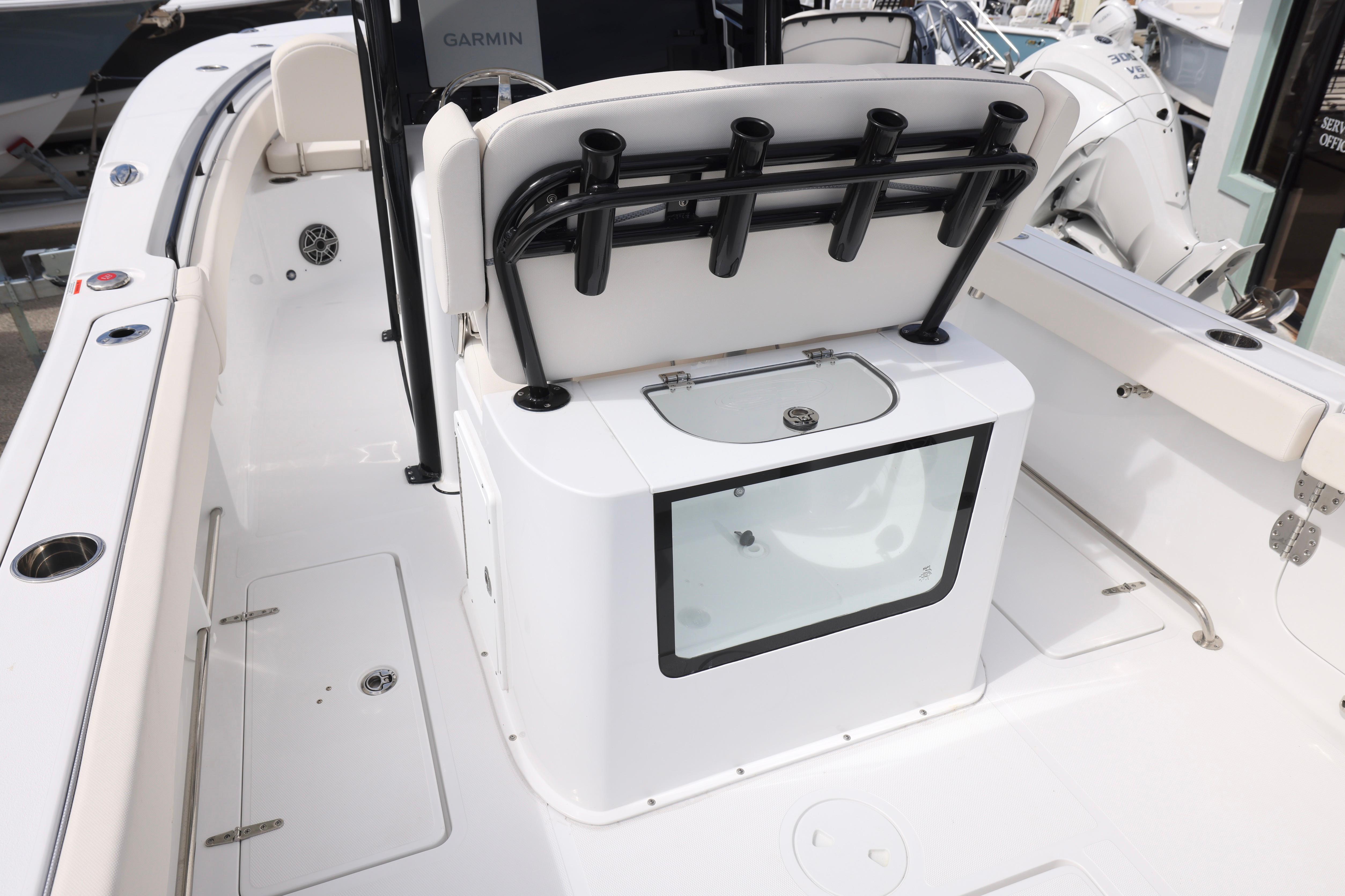 2026 Sea Hunt Gamefish 25 boat interior with rod holders and storage compartments.