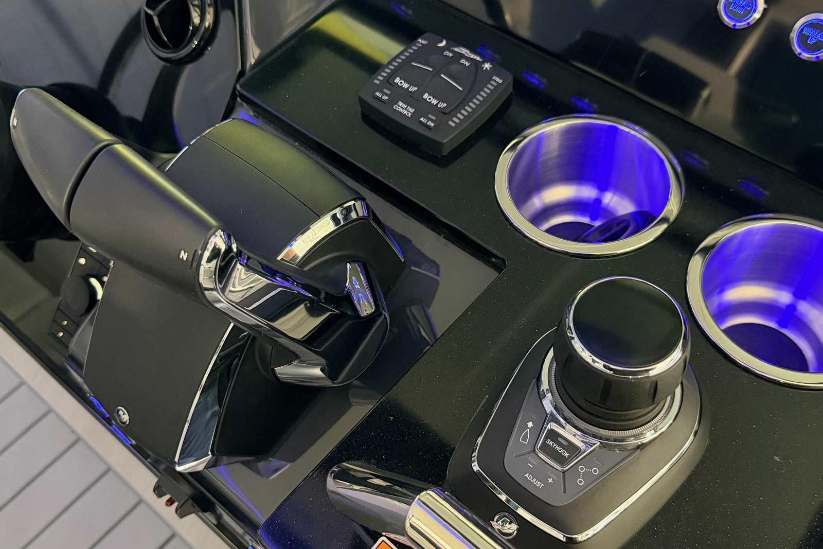 Control panel of 2025 Formula 387 Center Console Fish with illuminated cup holders.