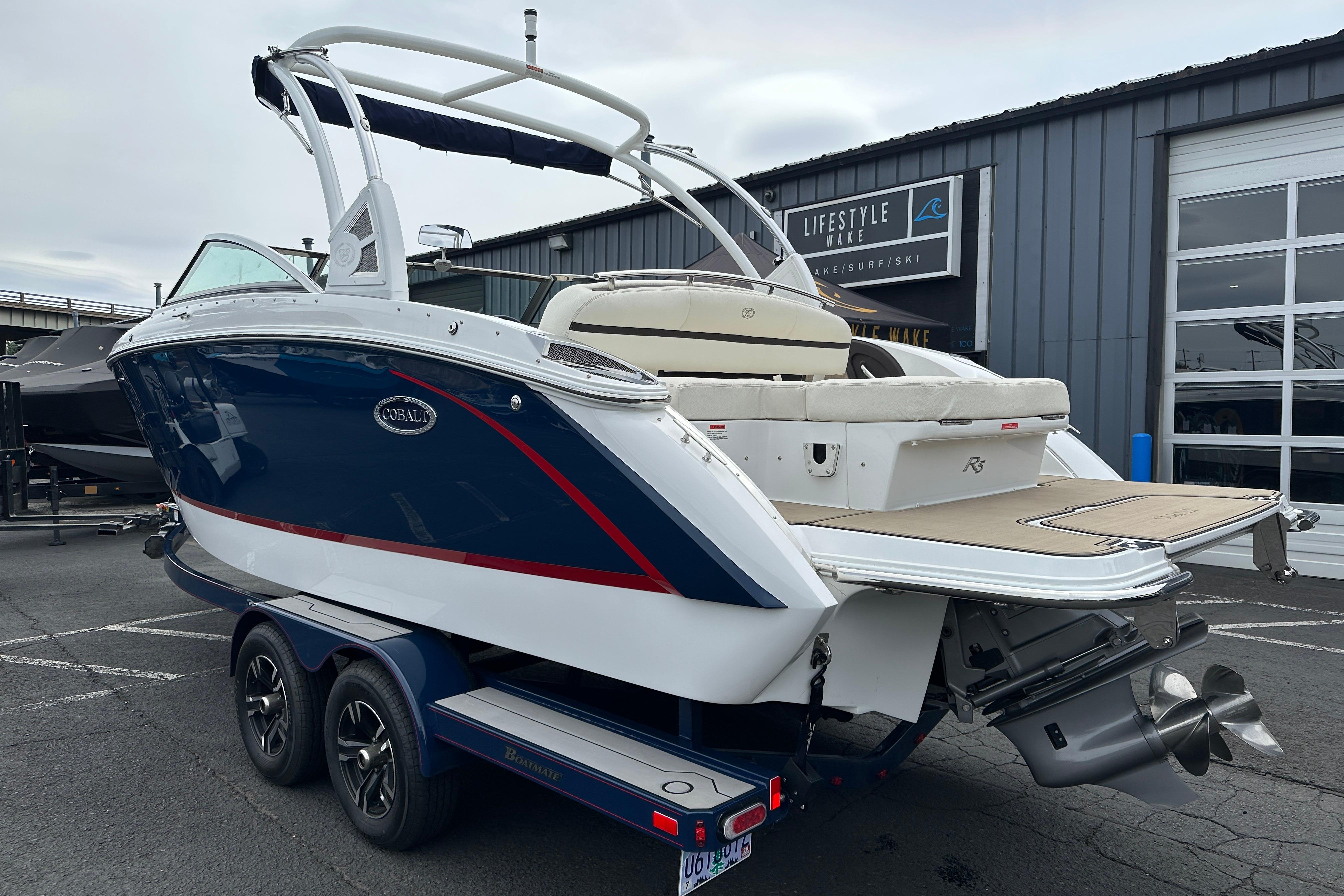 2019 Cobalt R5 boat on trailer, parked outside Lifestyle Wake shop.