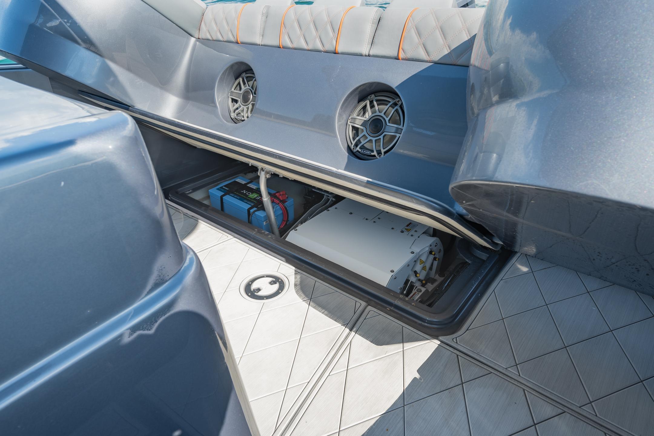 Storage compartment of 2022 Midnight Express 37' Open boat, showcasing interior features.