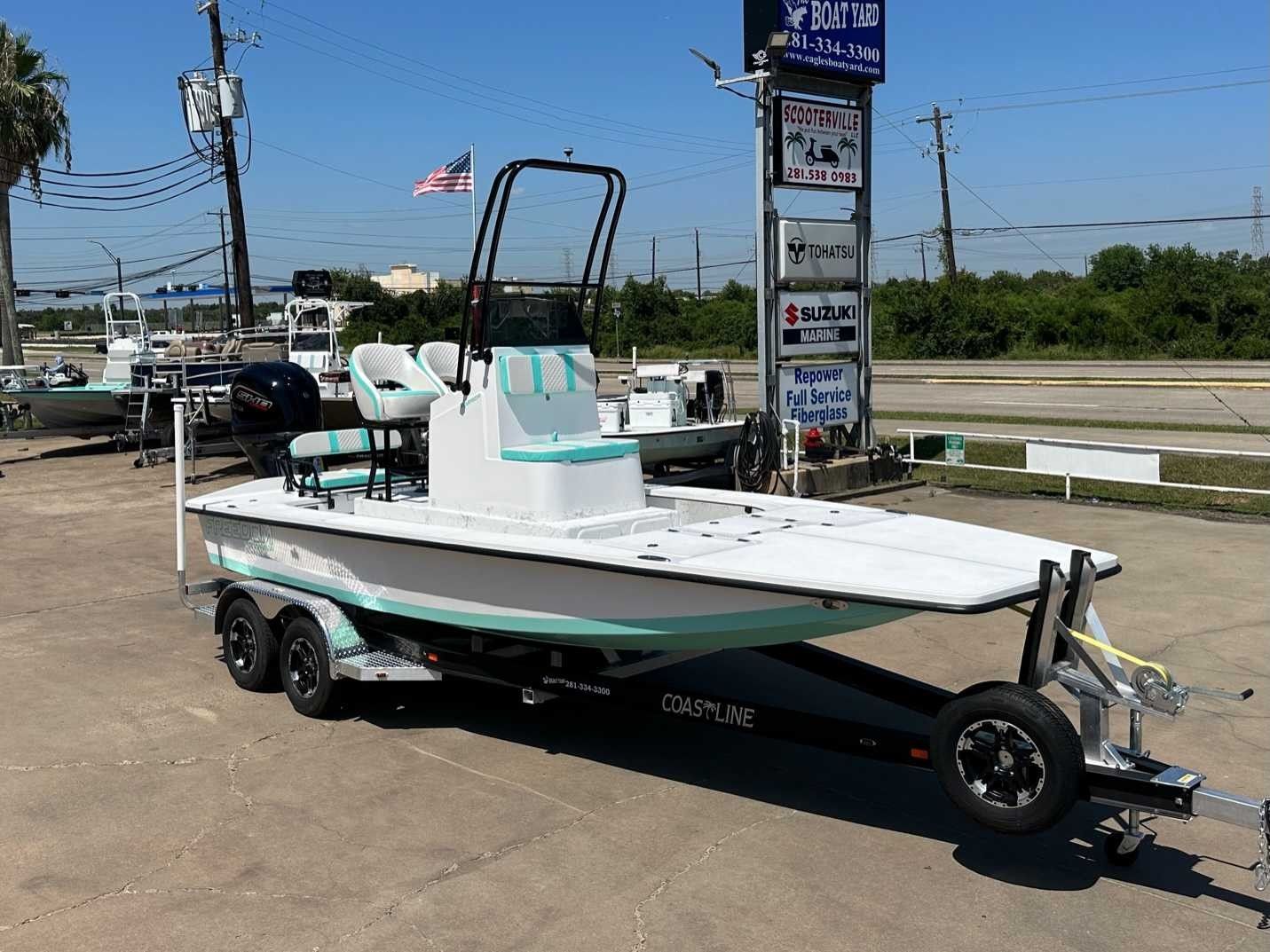 2026 Freedom Boats WARRIOR displayed outdoors on a trailer.
