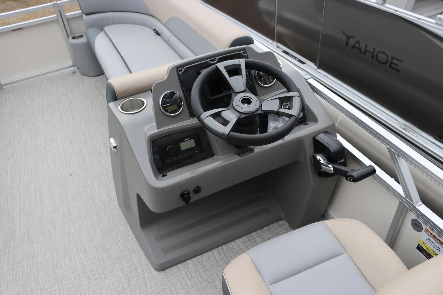 2025 Tahoe Pontoon Sport 85 Cruise steering console with modern controls and seating.