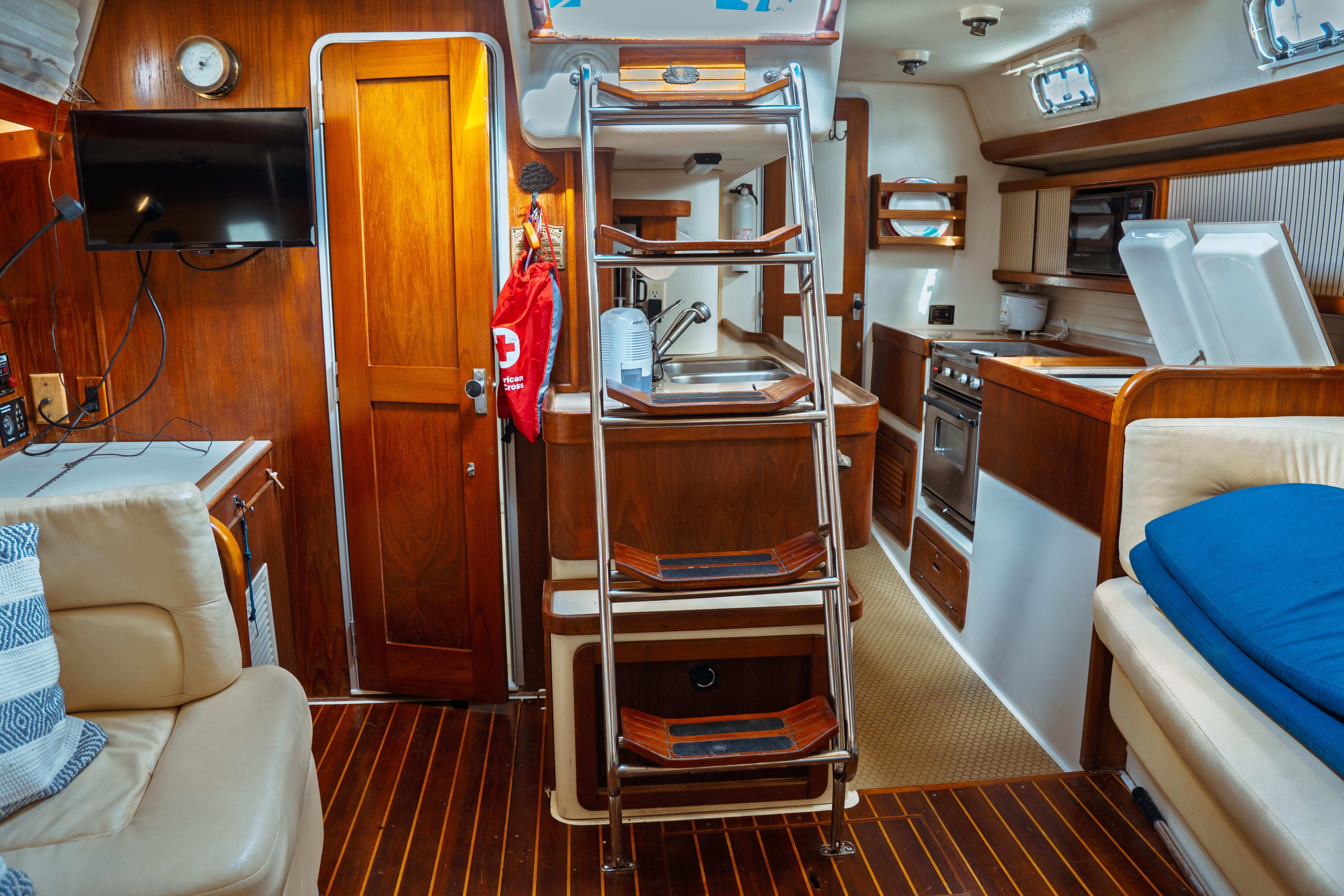 Interior of 1994 Catalina 38 CC sailboat with wood finish and modern amenities.