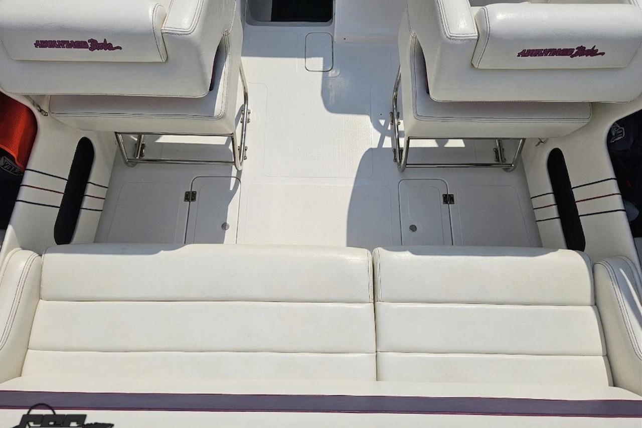 Interior of 2019 Advantage 25 Citation Bowrider with white seating and logo details.