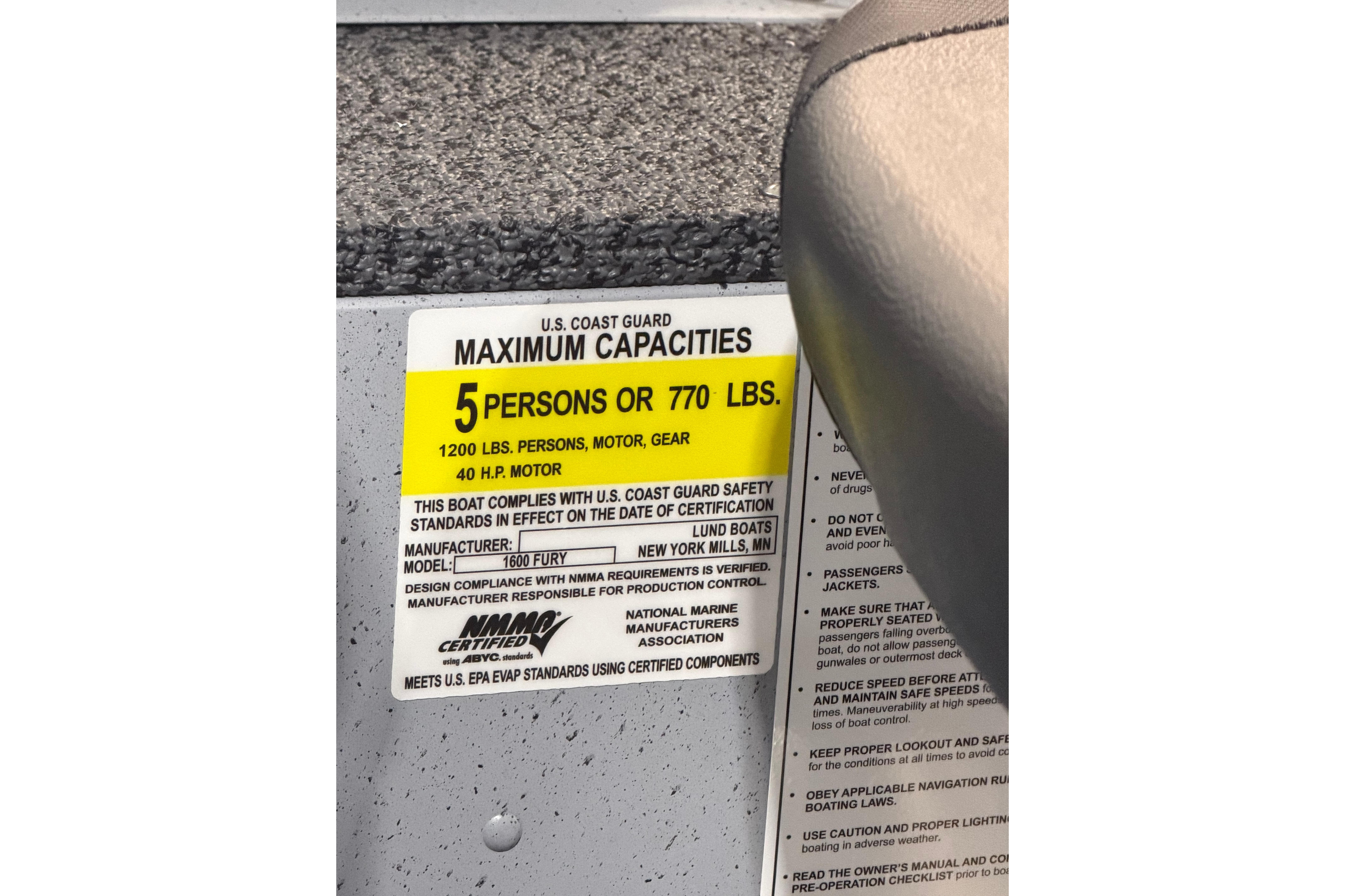 2027 Lund 1600 Fury SS boat capacity label, 5 persons or 770 lbs, 40 HP motor.