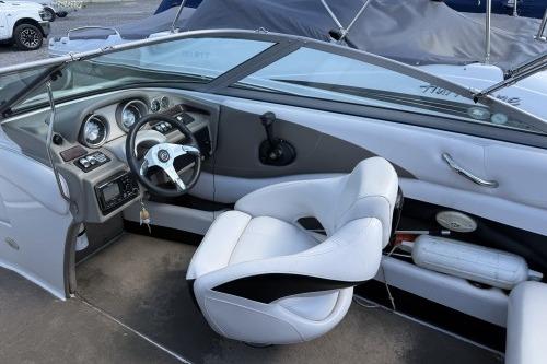 2012 Crownline 215 SS boat interior with sleek dashboard and comfortable seating.