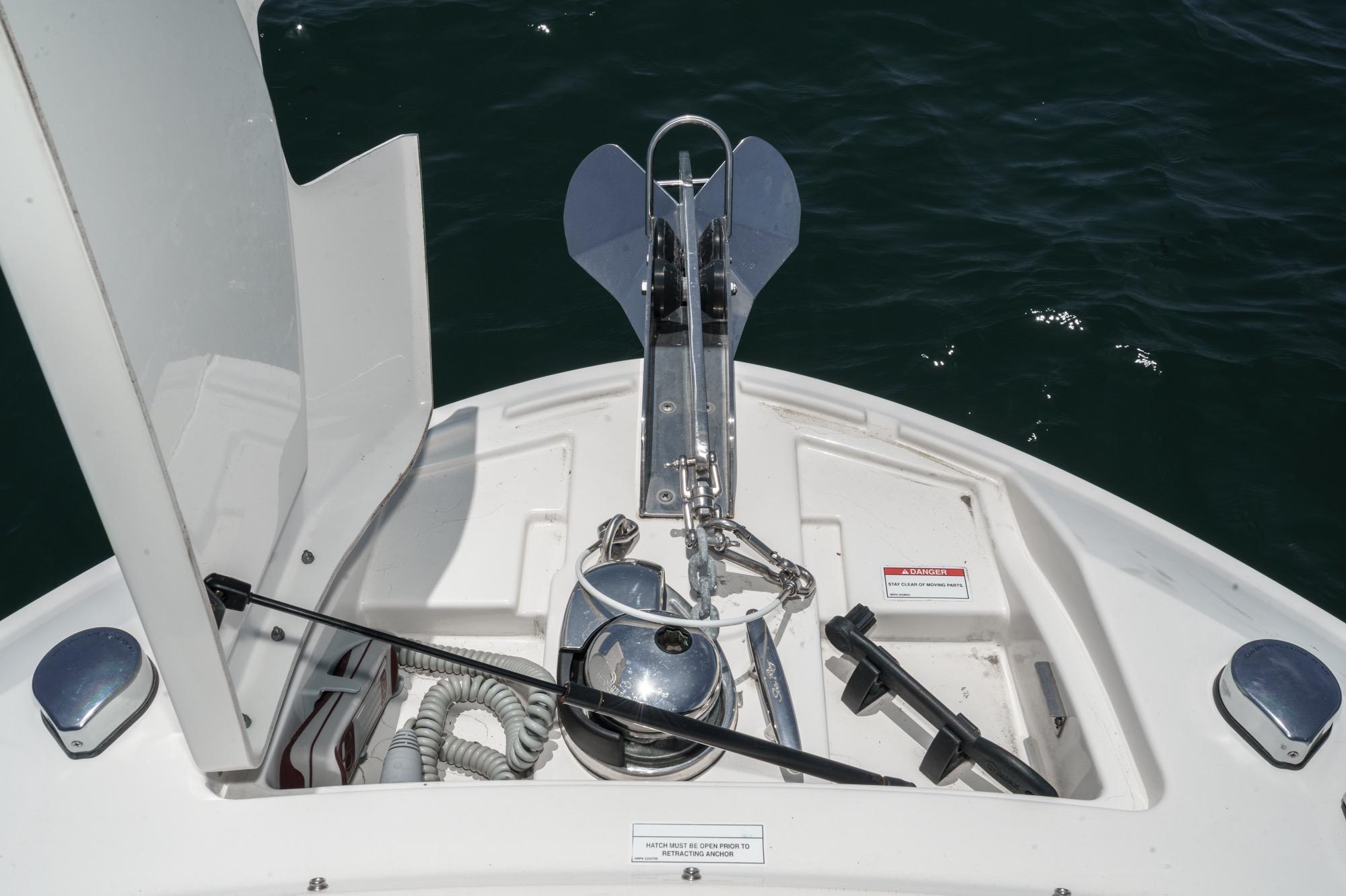 Bow of 2018 Sea Ray SLX 310 with anchor and marine equipment.