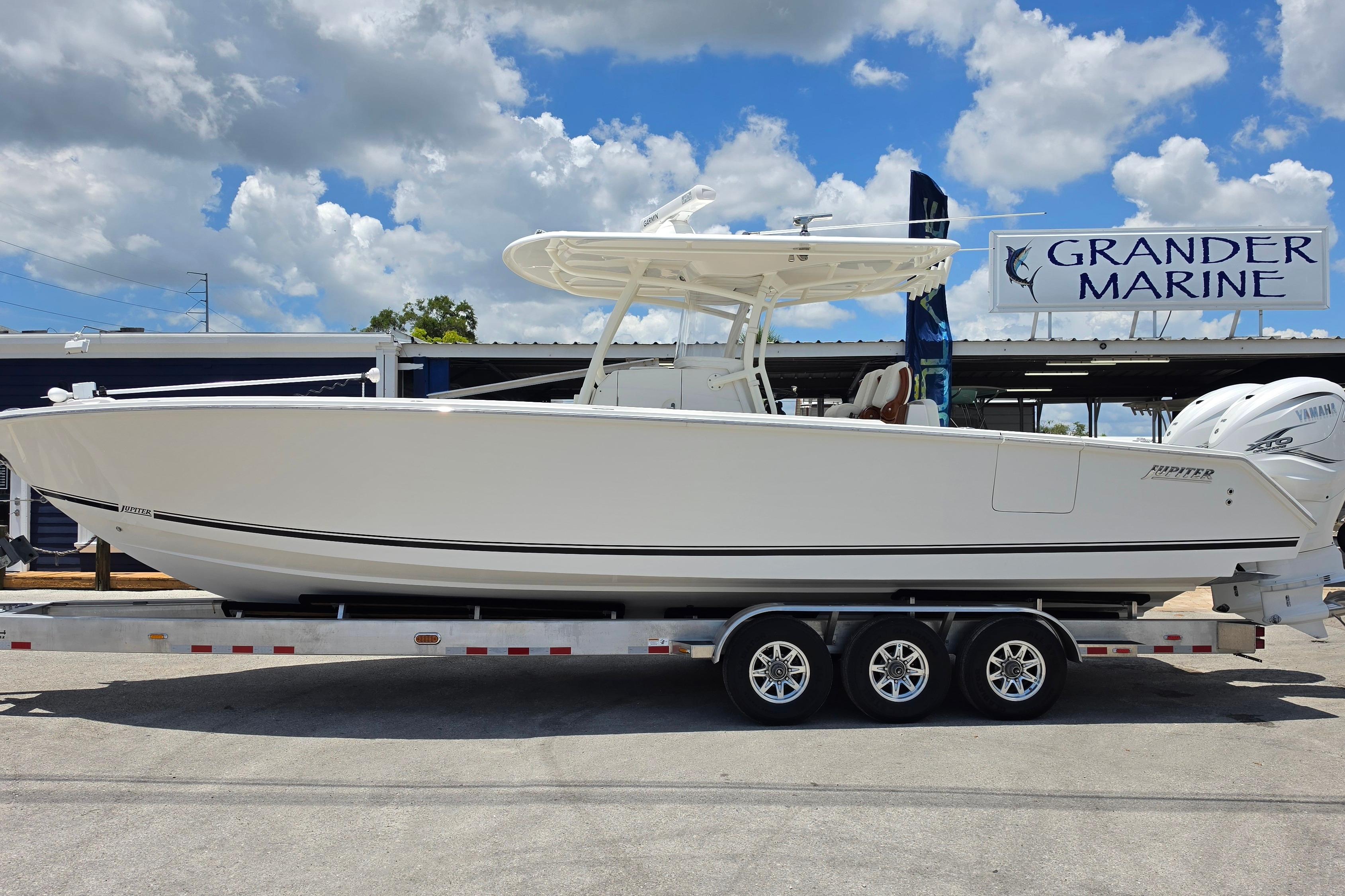 2020 Jupiter 34 HFS boat on trailer at Grander Marine dealership.