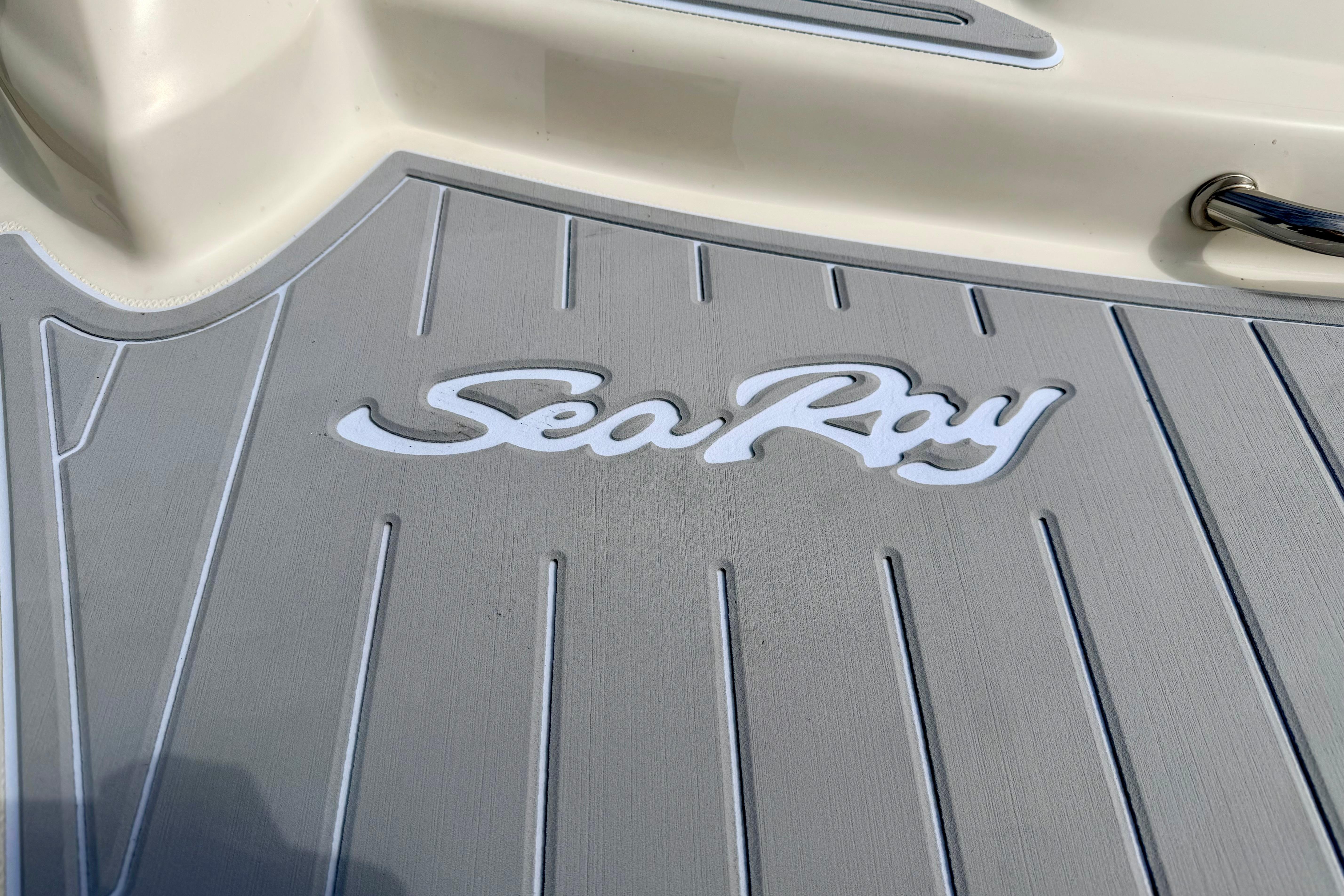 Sea Ray logo on 2003 Sea Ray 200 Sundeck boat deck.