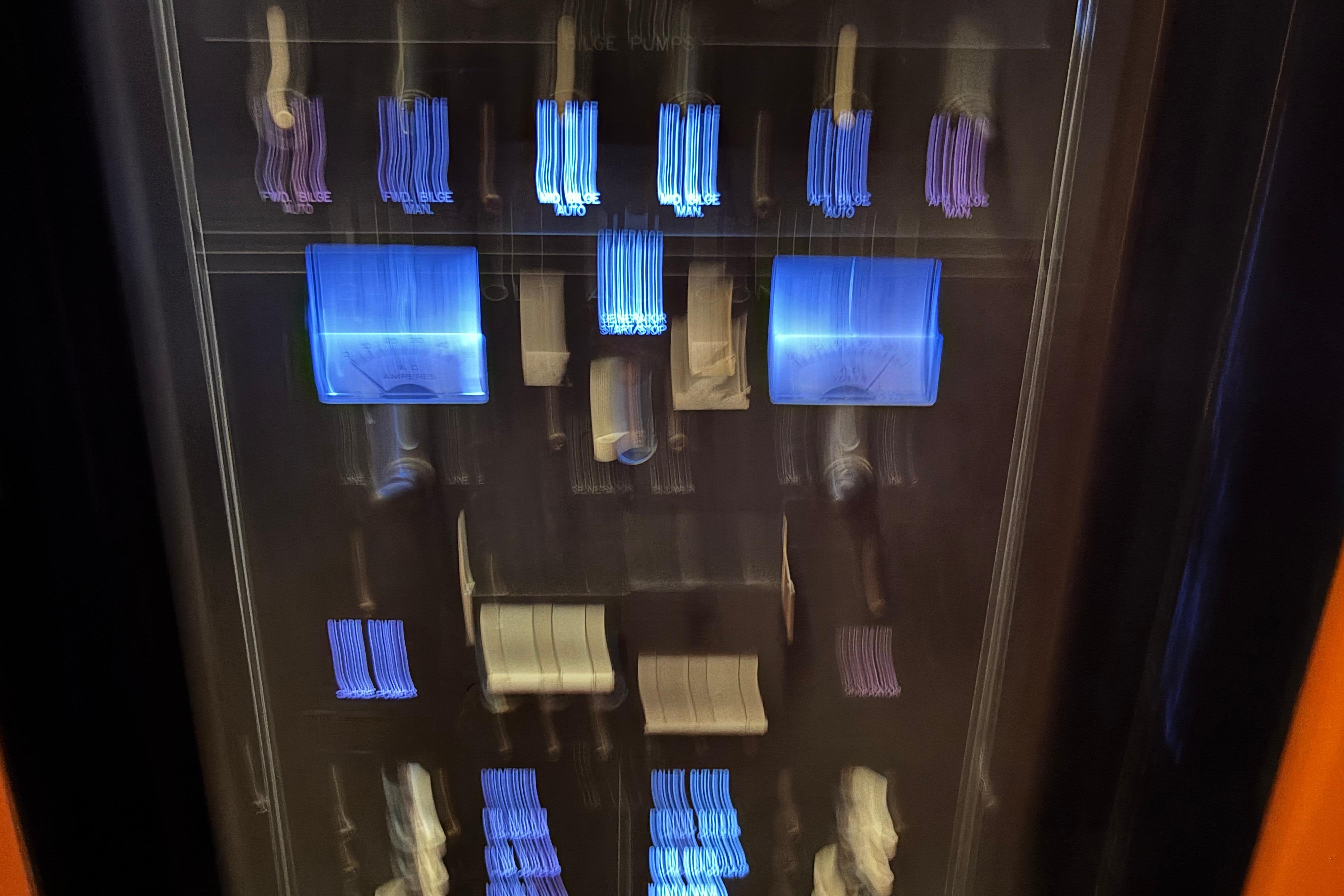 Control panel of a 2001 Silverton 410 Sport Bridge with illuminated switches and gauges.