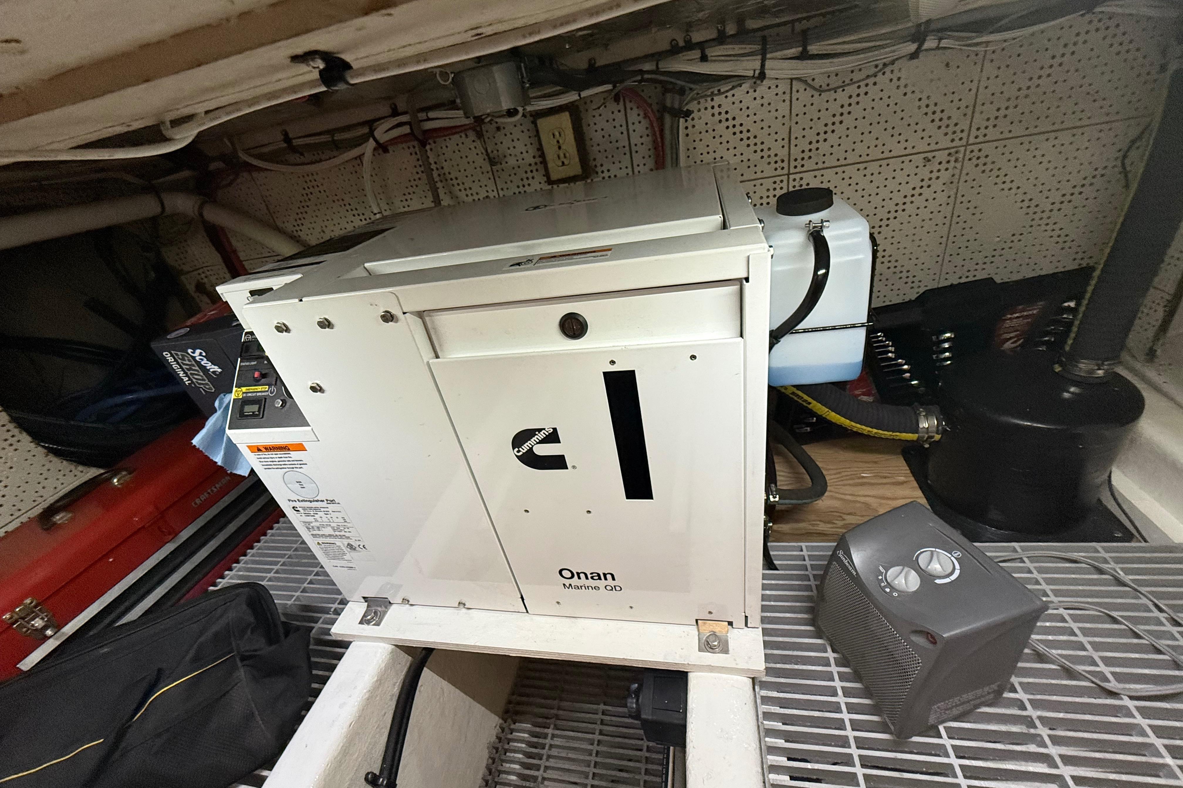 Onan Marine QD generator in 1978 DeFever 39 engine room.
