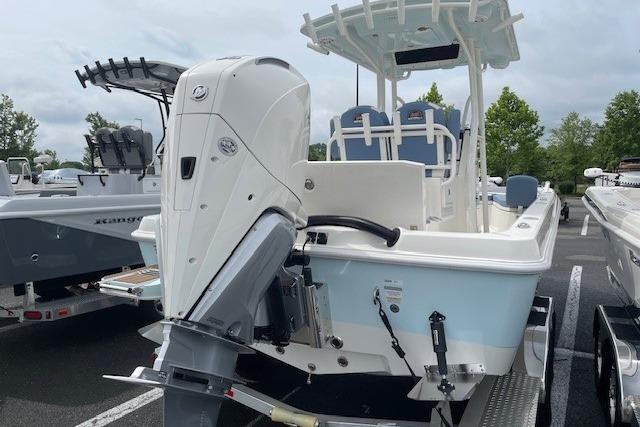 2025 Ranger 2360 Bay boat with outboard motor on trailer.