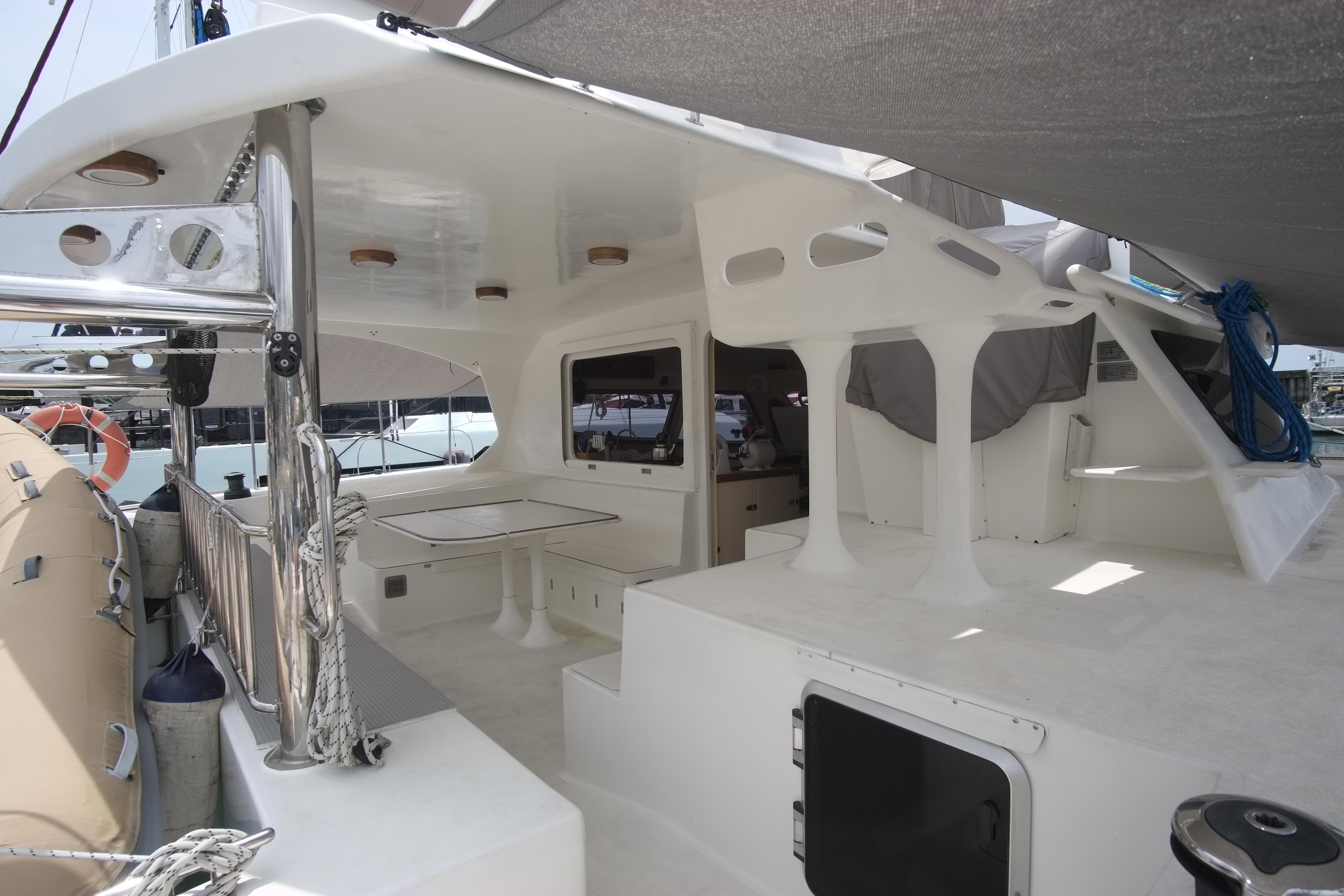 2015 Catamaran Catathai 50 interior with spacious deck and seating area.