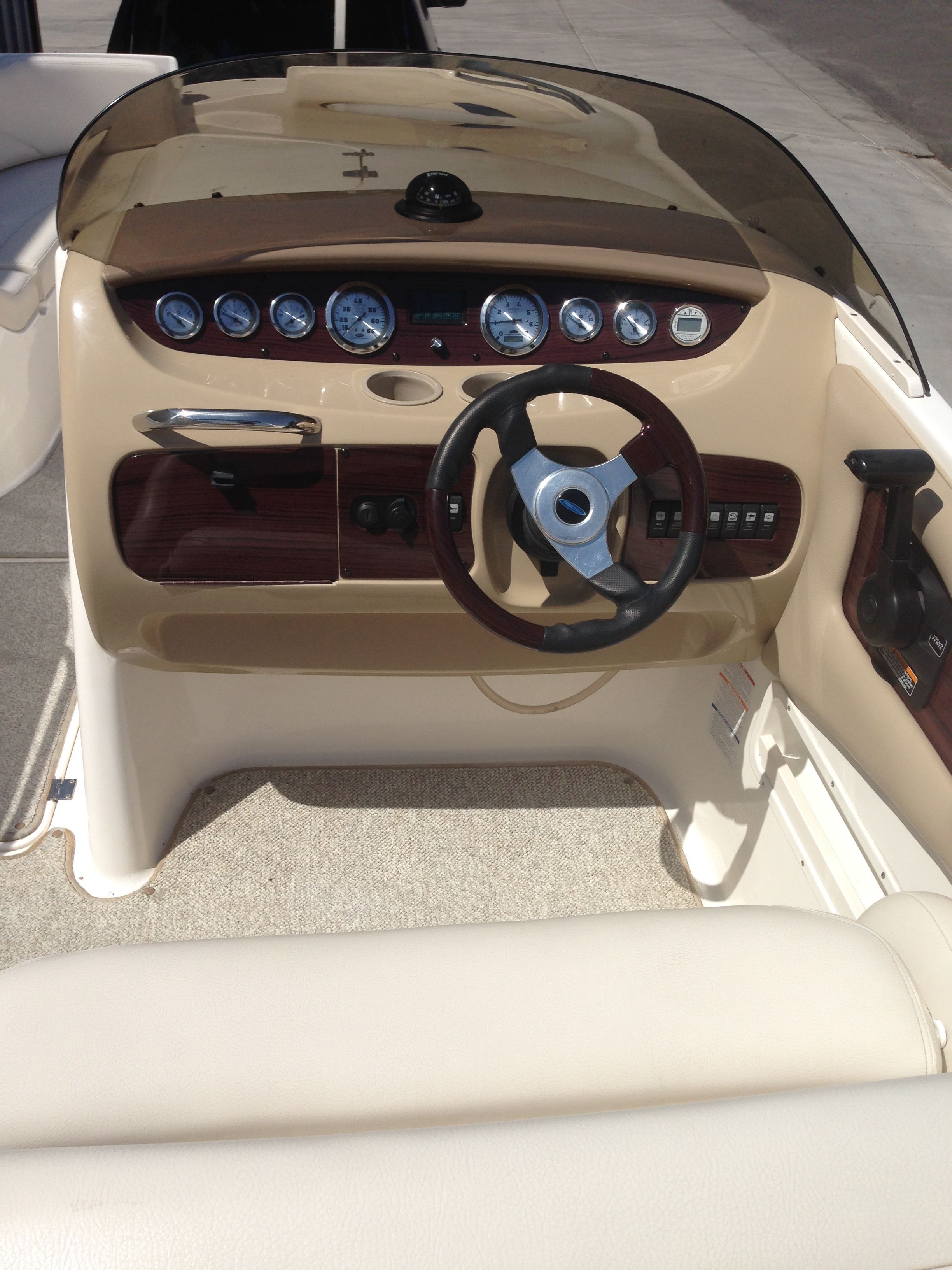 Cockpit of a 2003 Chaparral Sunesta 242 boat.