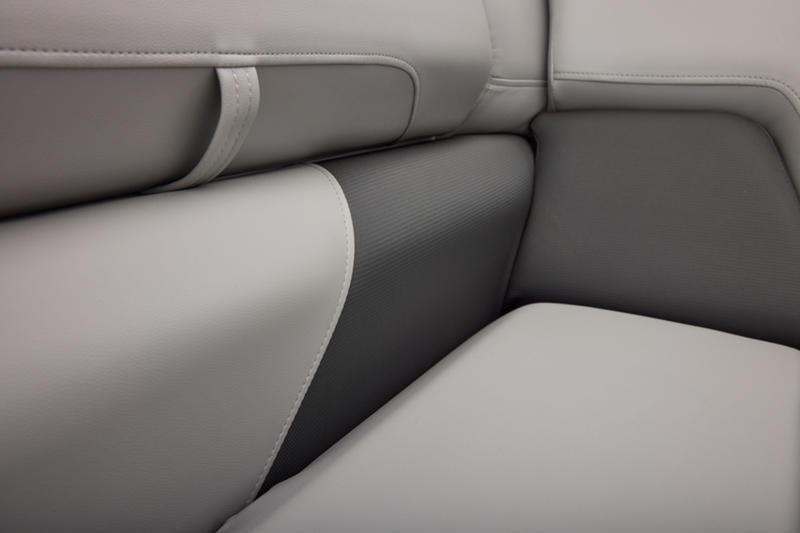 2026 Sun Tracker Party Barge 22 DLX interior seating, featuring sleek, modern upholstery design.