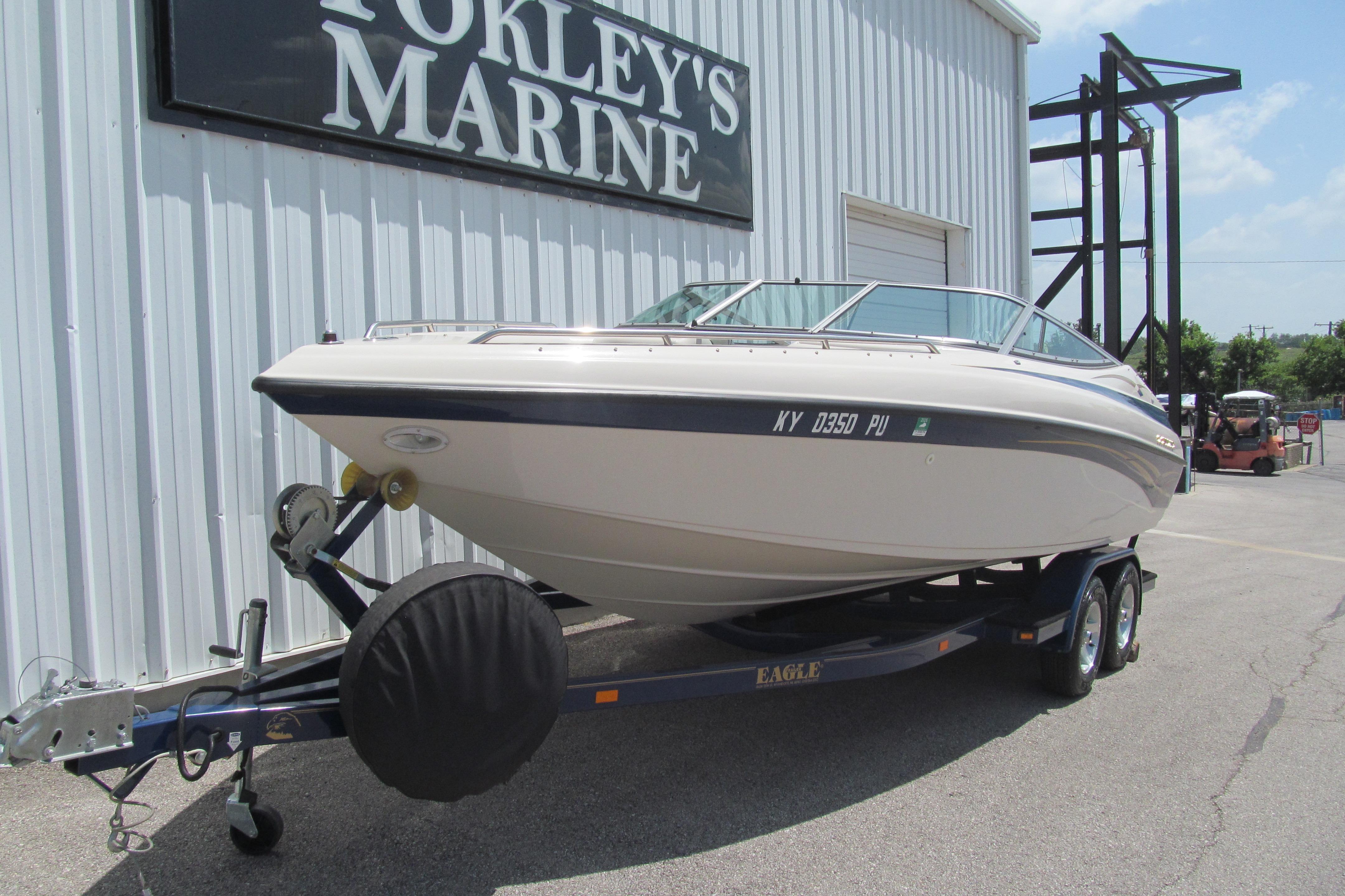 2001 Crownline 225 BR boat on trailer at Forkley's Marine dealership.